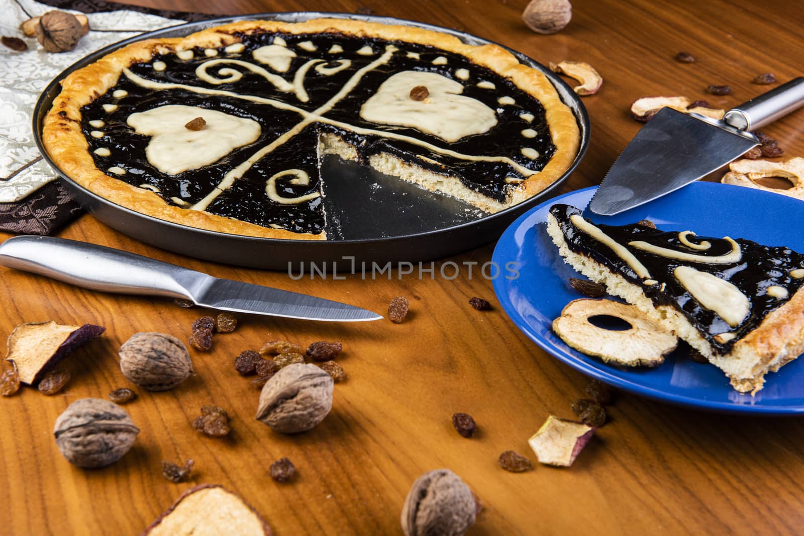 Czech traditional cake "kolac" on a wooden table by fyletto