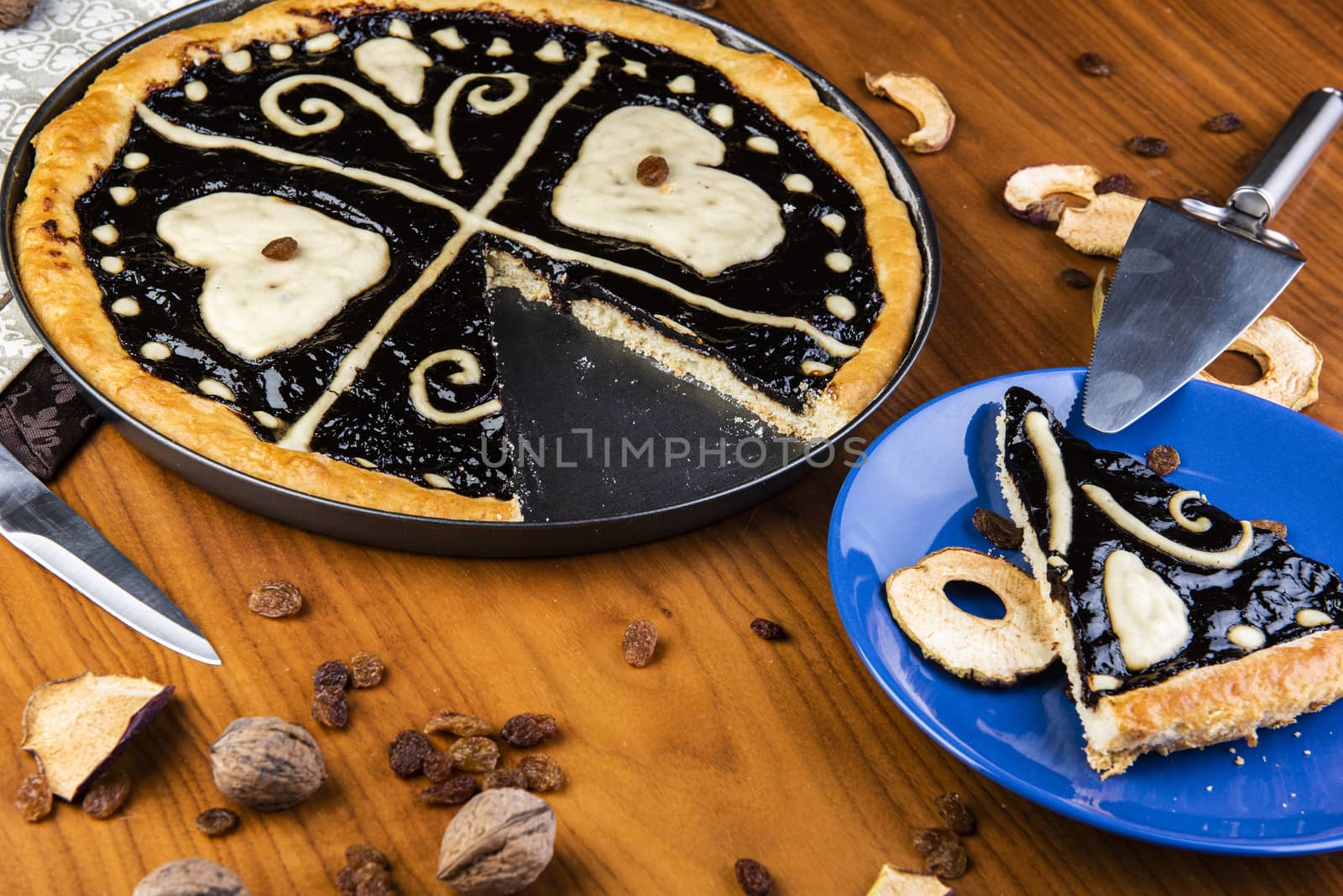 Czech traditional cake "kolac" on a wooden table by fyletto