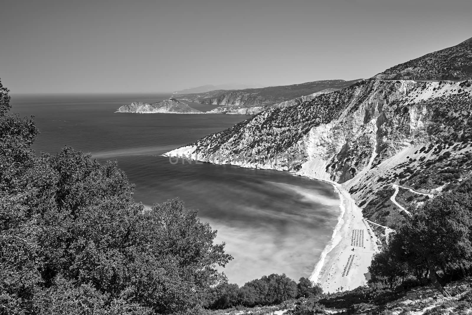 Rocky coast and Mitros beach on the island of Kefalonia in Greece, monochrome