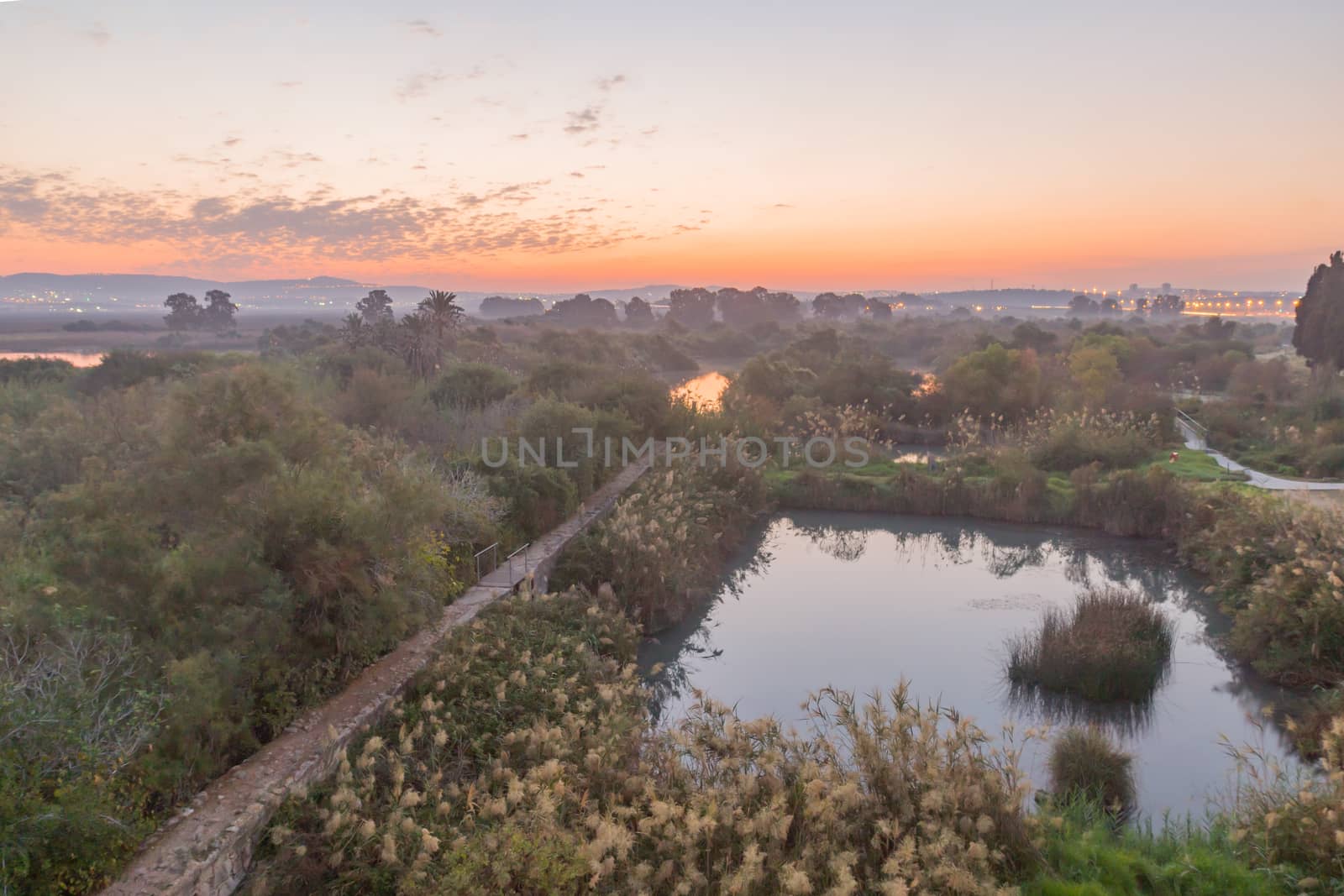 Sunrise view over wetland and ancient canal system, in En Afek nature reserve, northern Israel