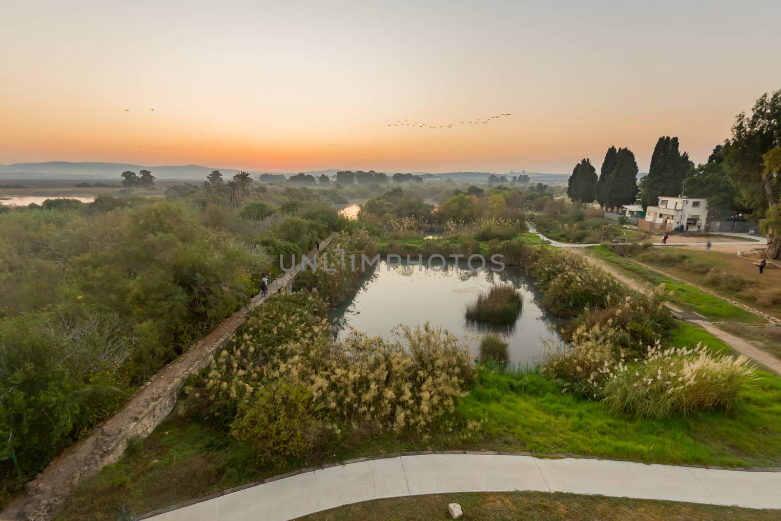 Sunrise view over wetland and ancient canal system, in En Afek nature reserve, northern Israel