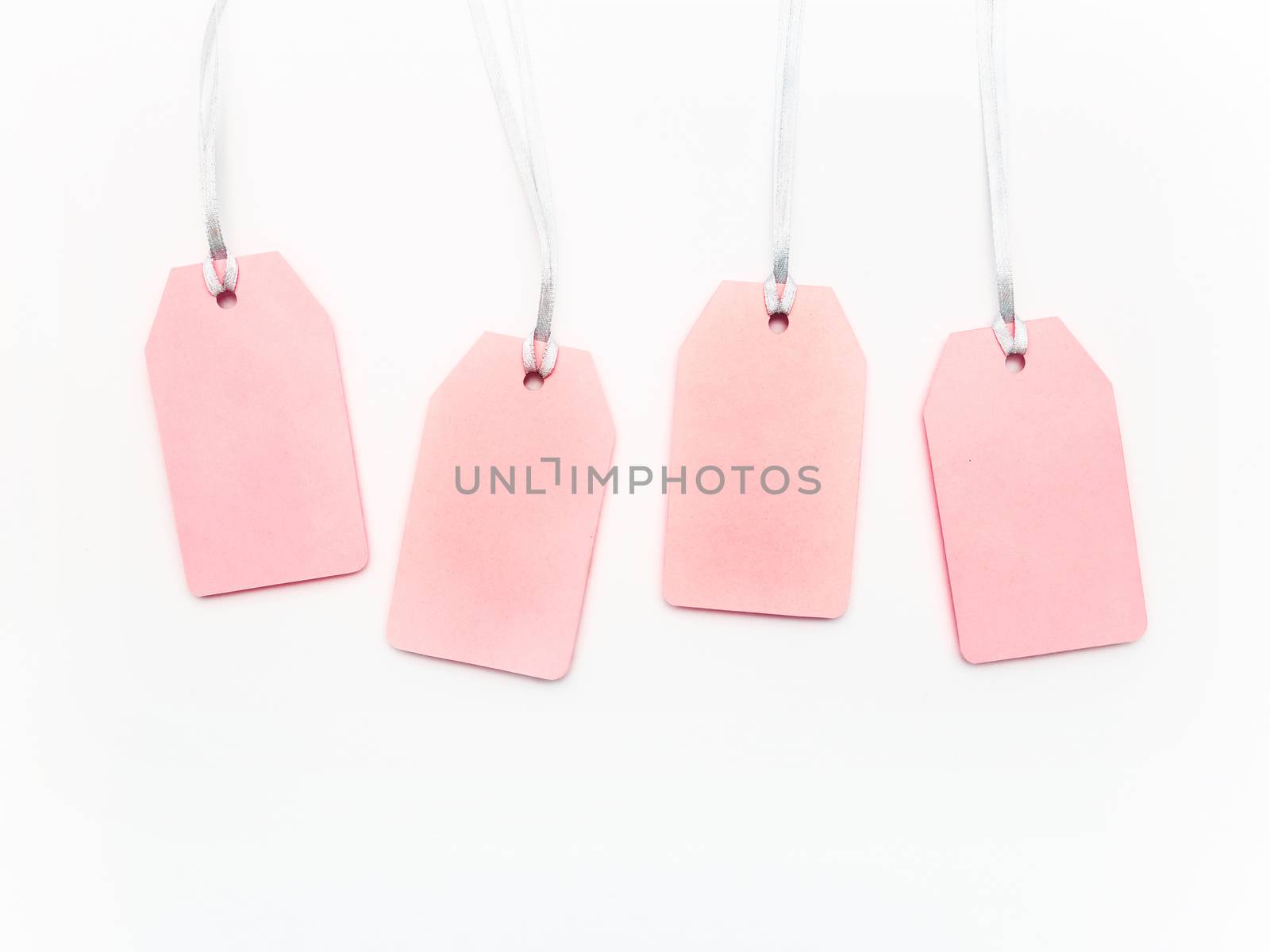 Four pink clear tags on white background. Glamorous labels on si by aksenovko