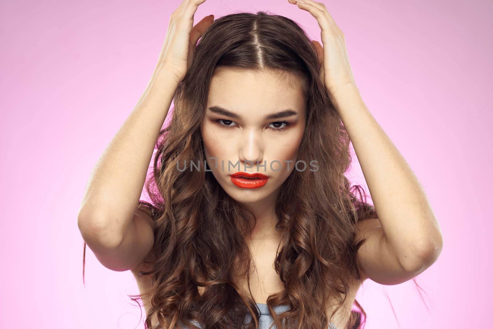 Woman with hairstyle and red lips naked shoulders bright makeup attractive look by SHOTPRIME