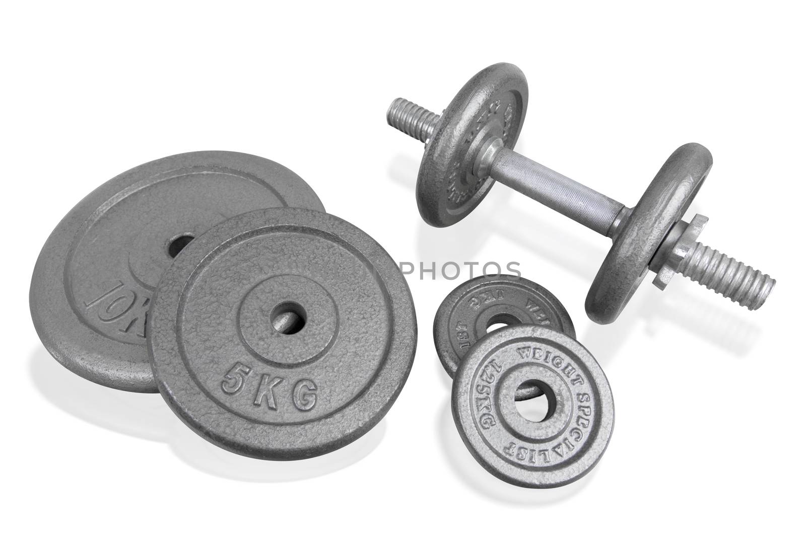 Fitness exercise equipment silver dumbbell and weights plate isolated on white background.