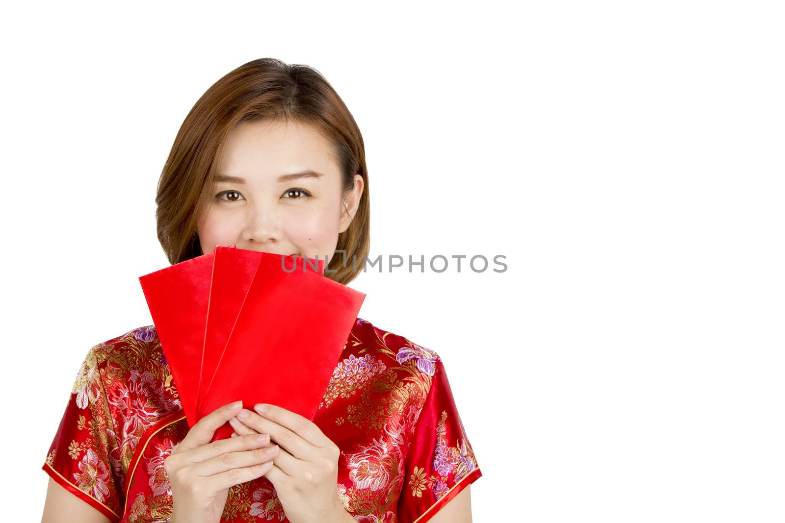 Asian girl got big surprise holding ung-pao or red pocket gift on isolated white background.