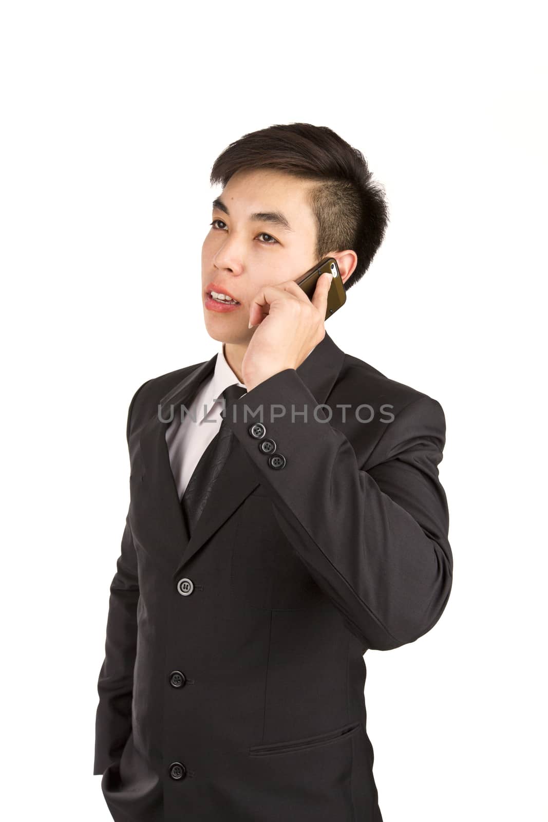 Young Businessman calling by phone. Isolated on white background : Asia