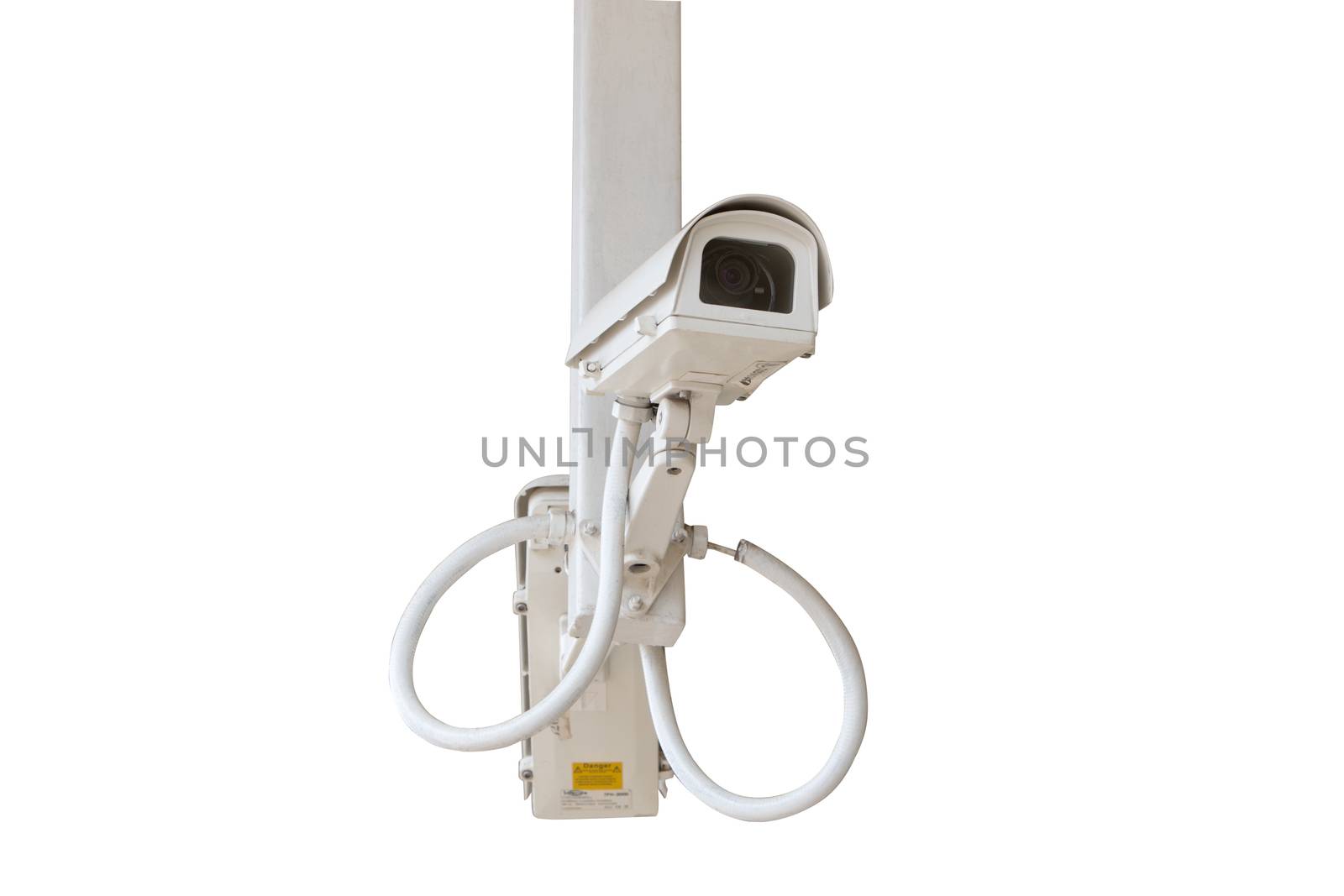Security camera isolated on blue sky background.