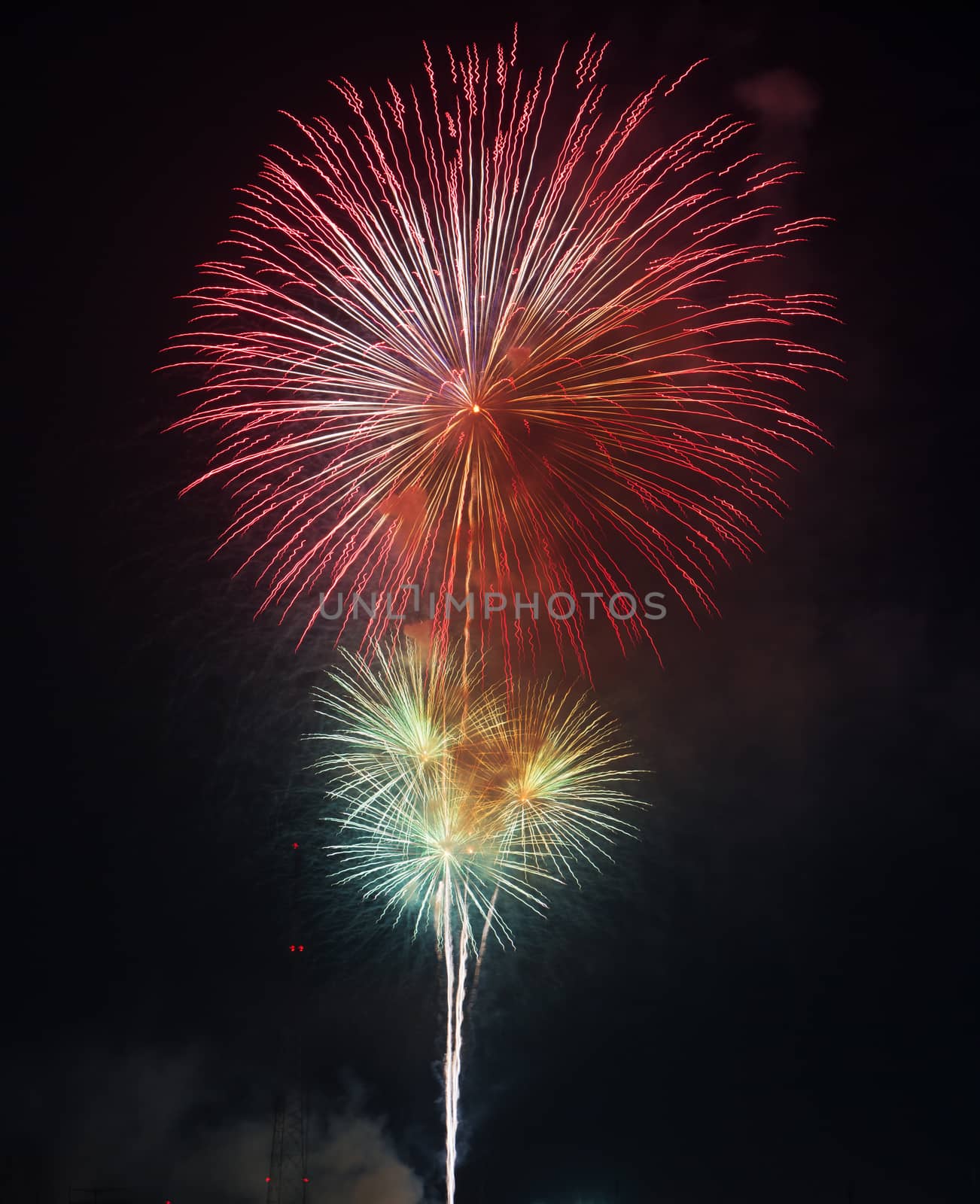 Beautiful colorful firework on the sky at night. by jayzynism