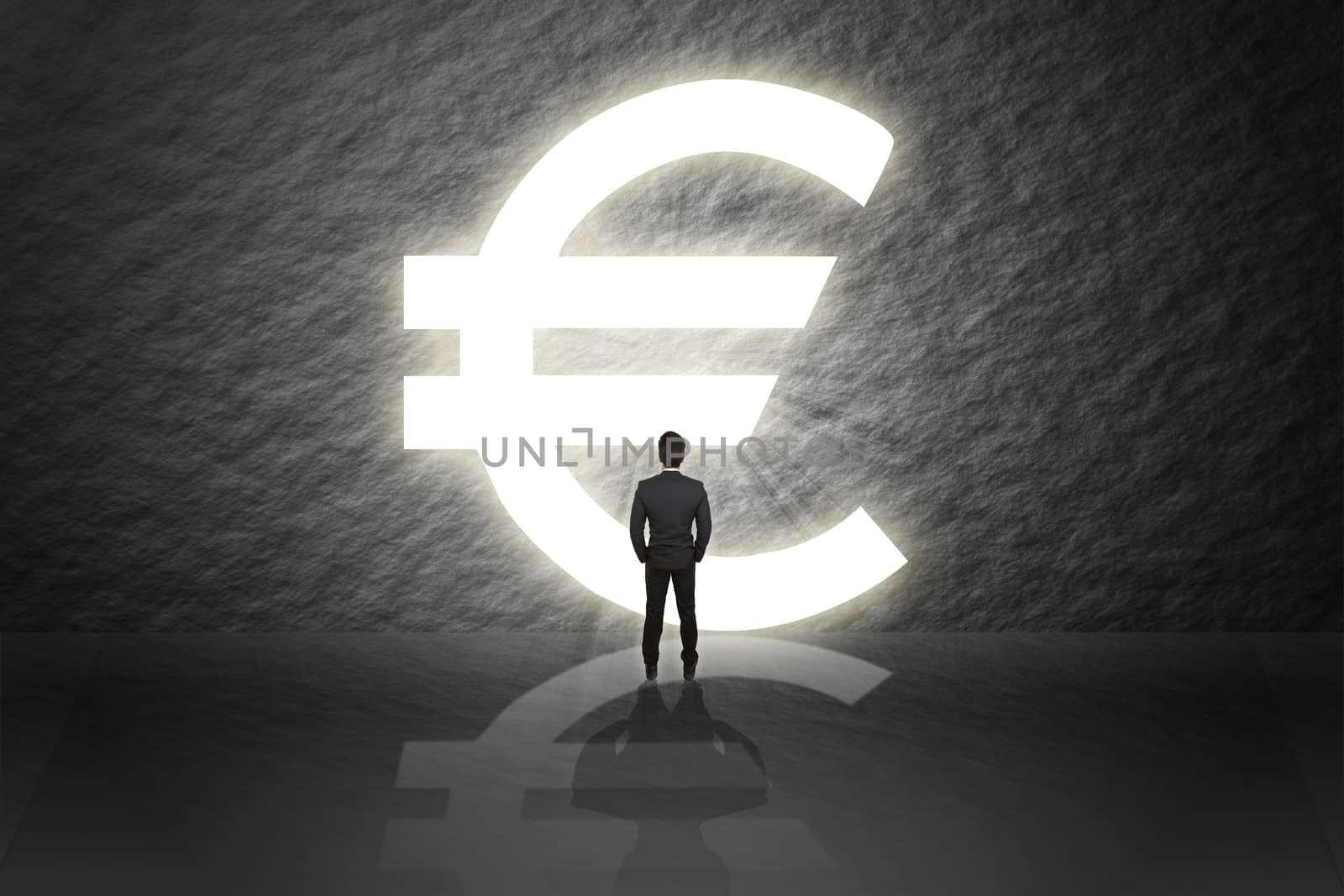 Businessman in suit stand and looking aim the door success euro pound money sign isolated cement abstract background.