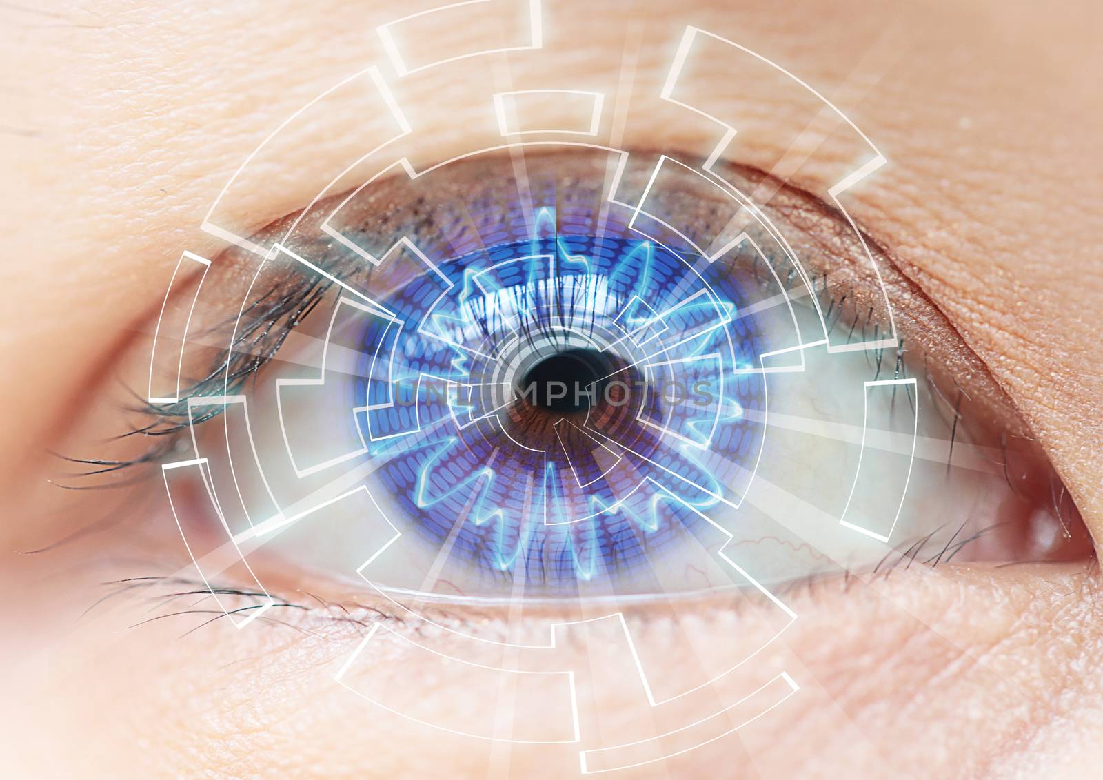 Close-up of woman's blue eye. High Technologies in the futuristic. : contact lens