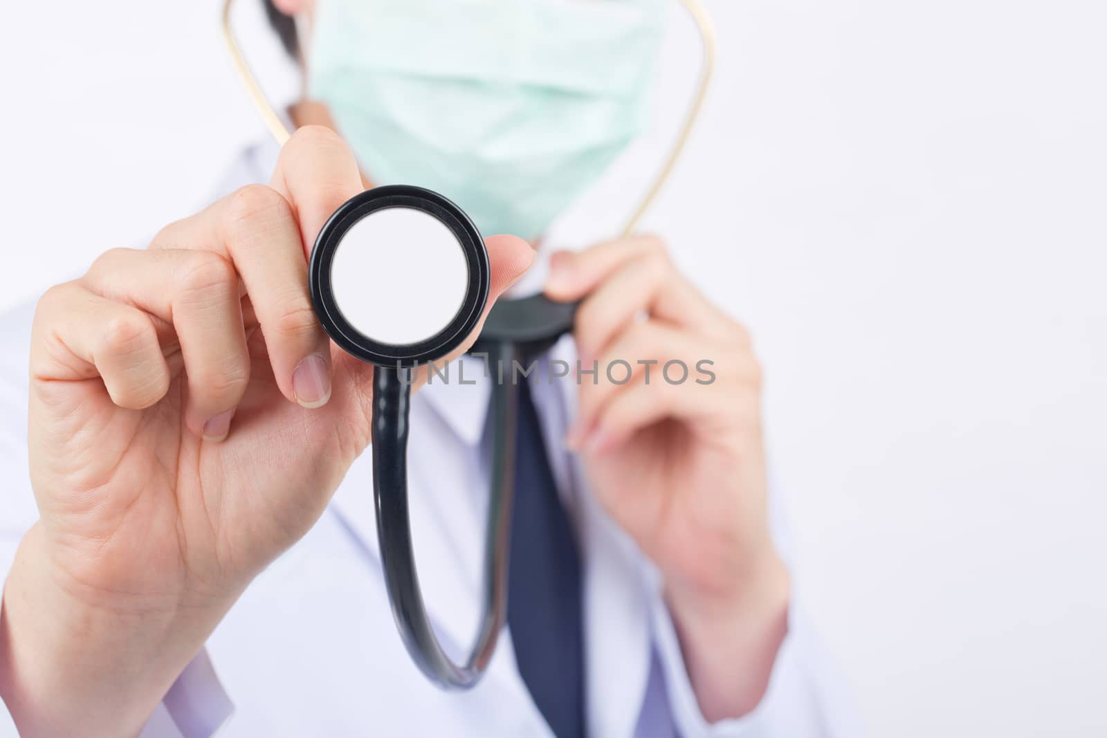 Doctor with a stethoscope in the hand prepare check patient. by jayzynism