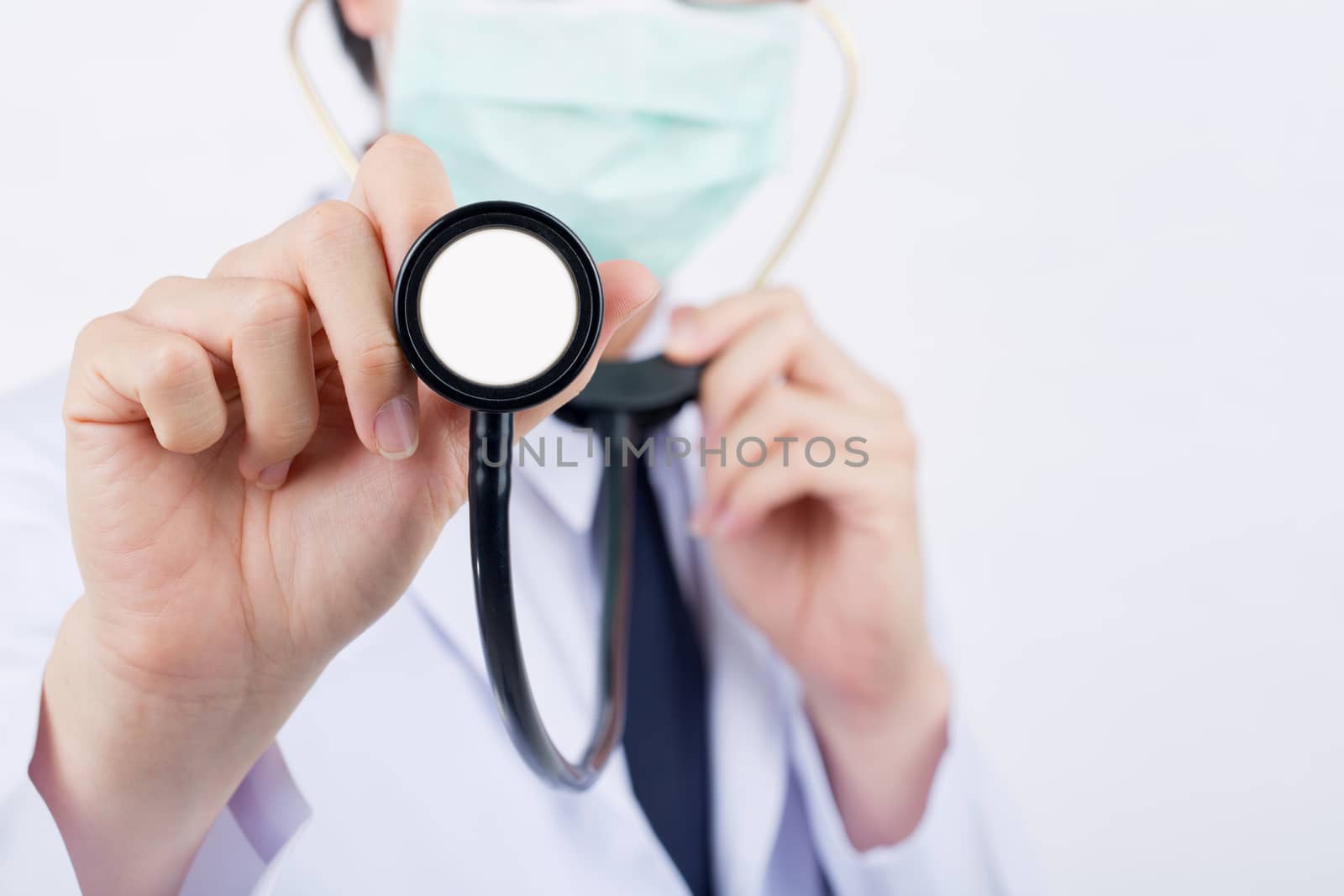 Doctor with a stethoscope in the hand touch monitor.