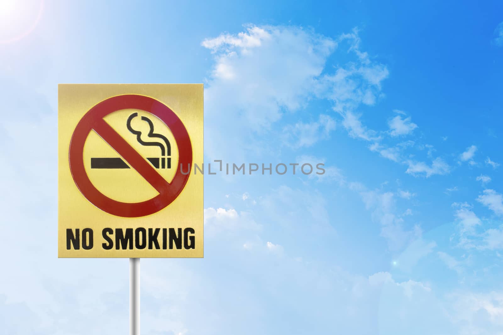 Do not Smoking gold sign on the sky.