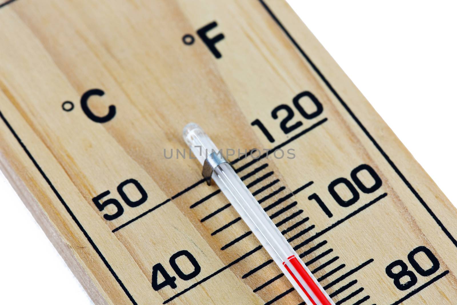 Close-up wooden thermometer scale isolated white background.