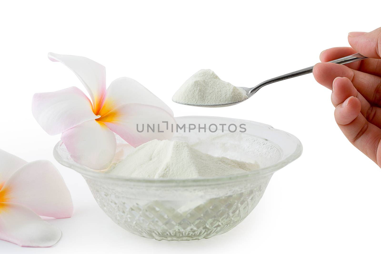 Collagen powder protein on spoon measure isolated on white background.
