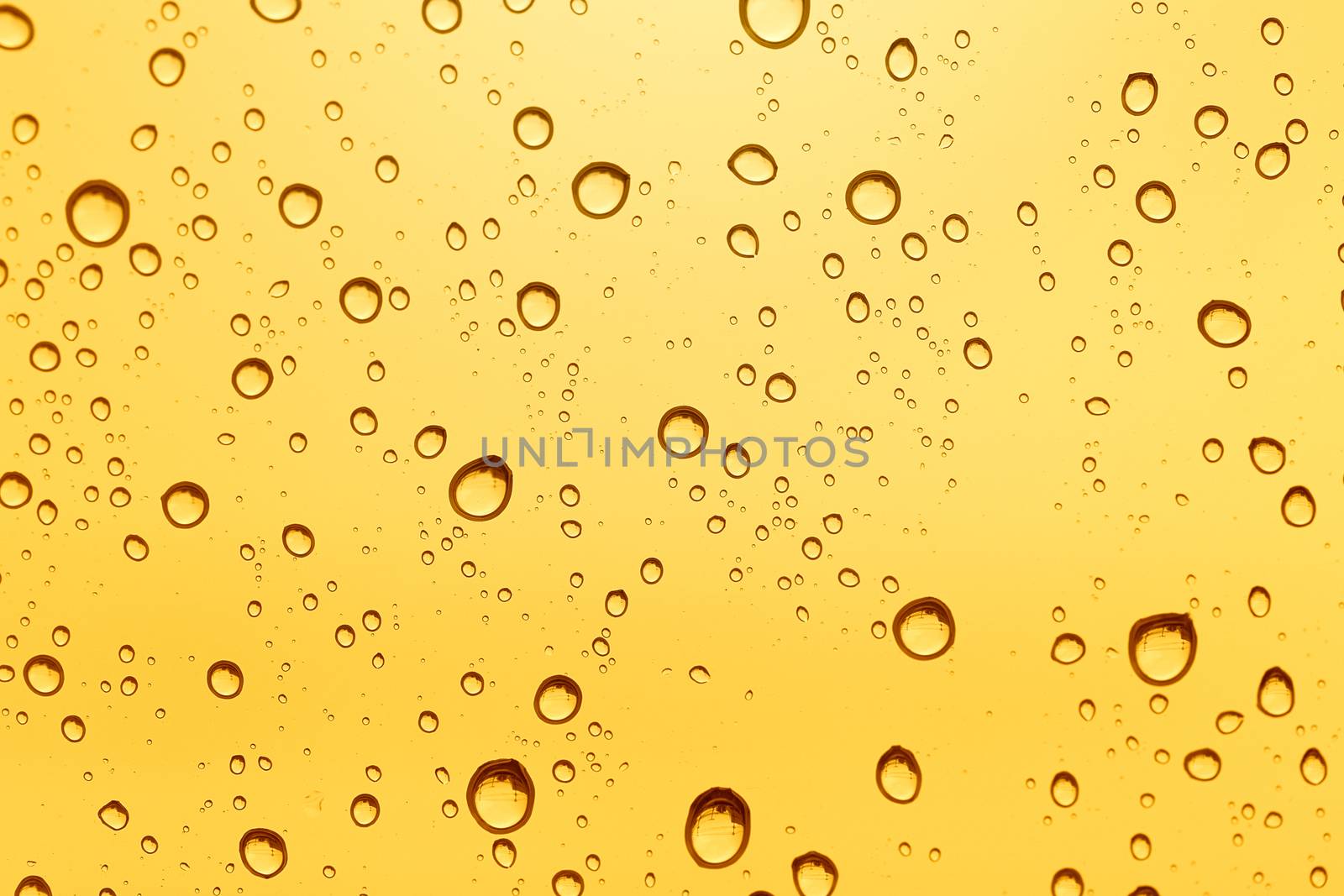 Gold water drop background. by jayzynism