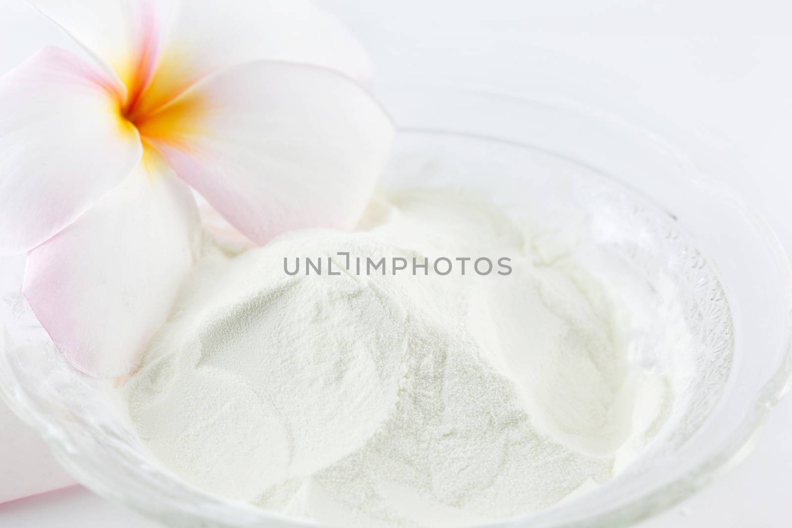 Collagen powder protein on spoon measure isolated on white background. by jayzynism