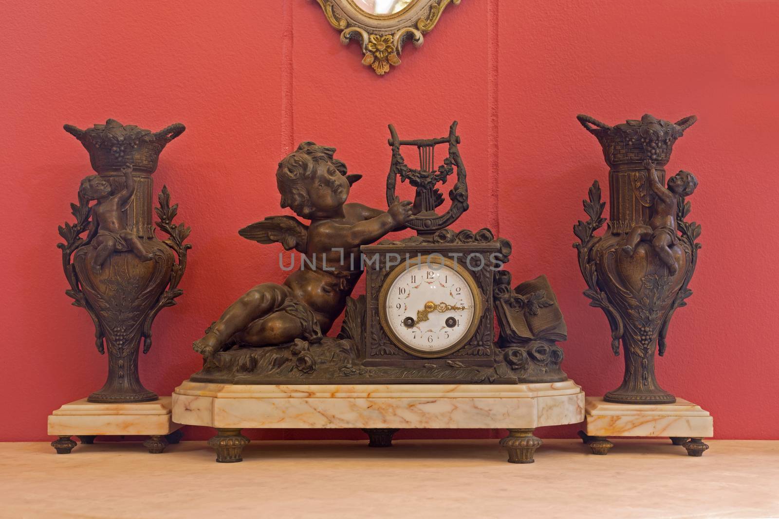 Old clock vintage antique with red wallpaper by jayzynism