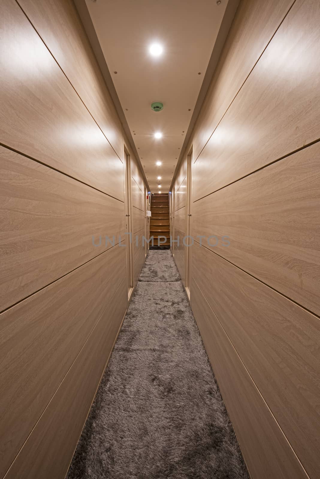 Interior design furnishing decor of corridor area in a large luxury motor yacht