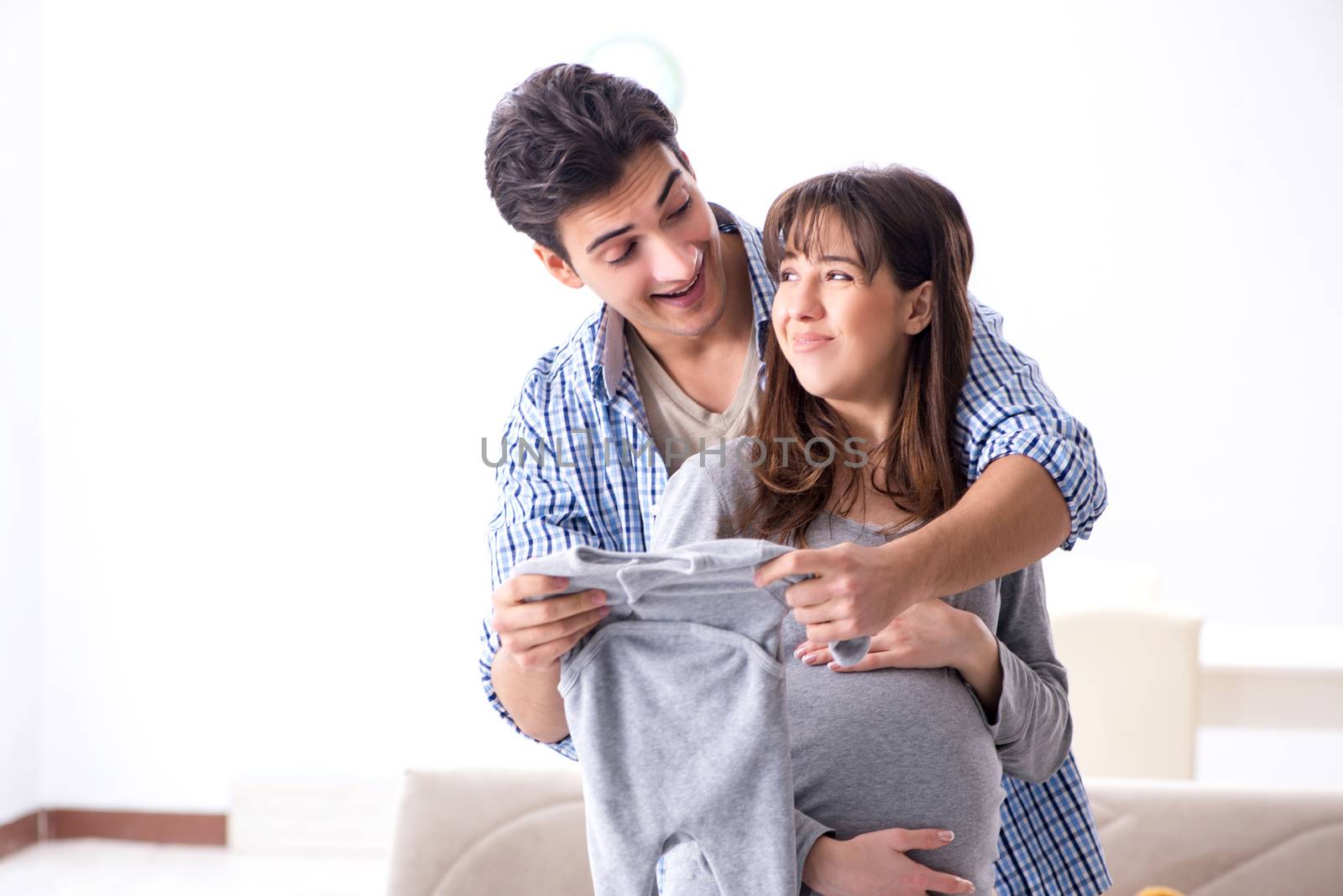 Young parents expecting their first baby