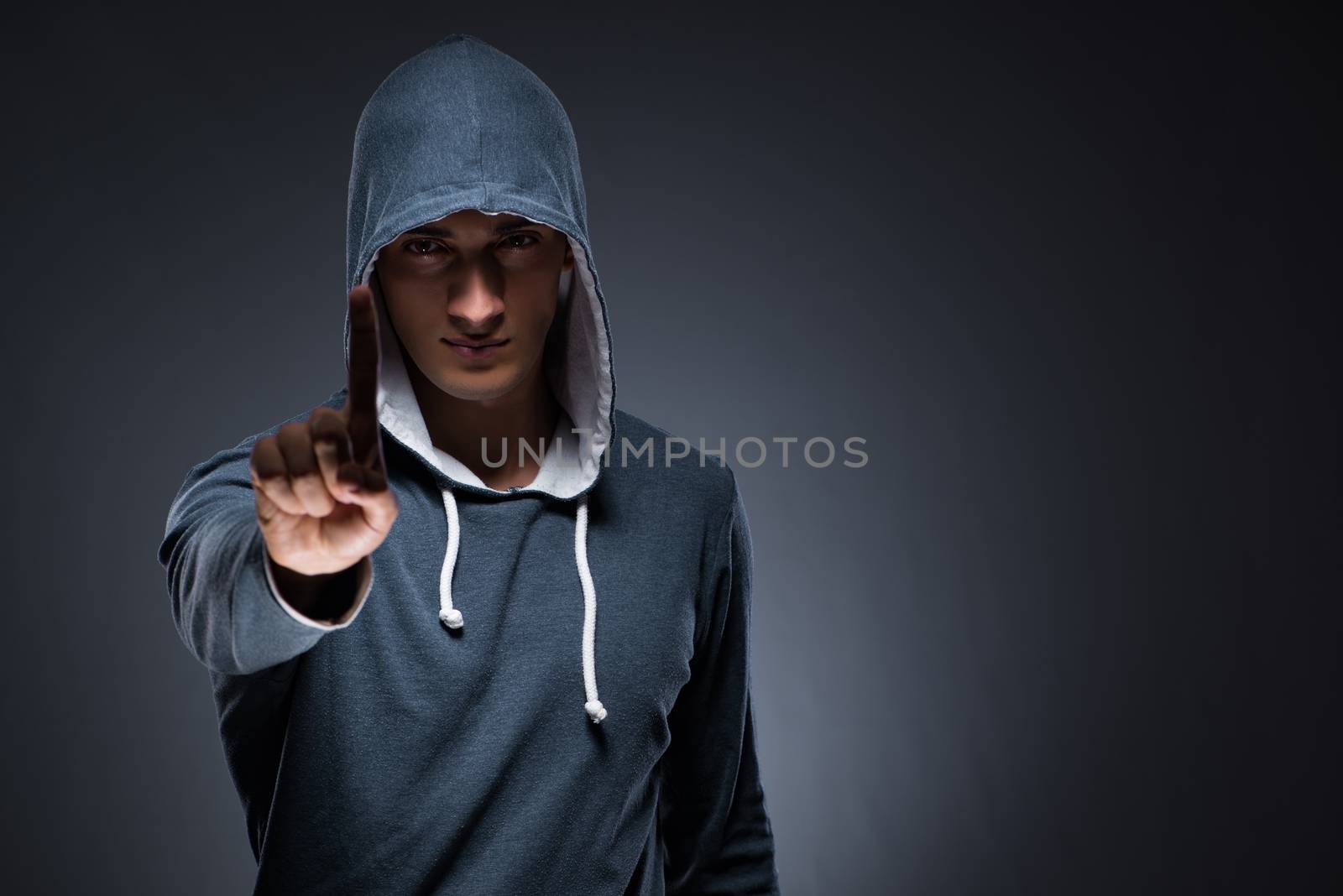 Innovation concept with young man pressing virtual buttons