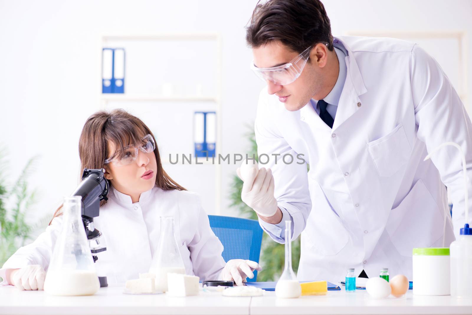 Two lab doctor testing food products