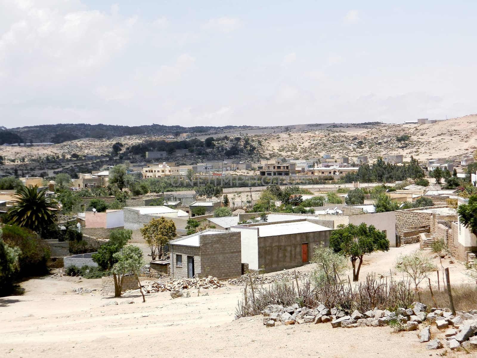 Tesseney, Eritrea - 10/11/2020: Beautiful photography of the landscape from the villages near the bord from Ethiopia. Old desert villages with some domestic animals.