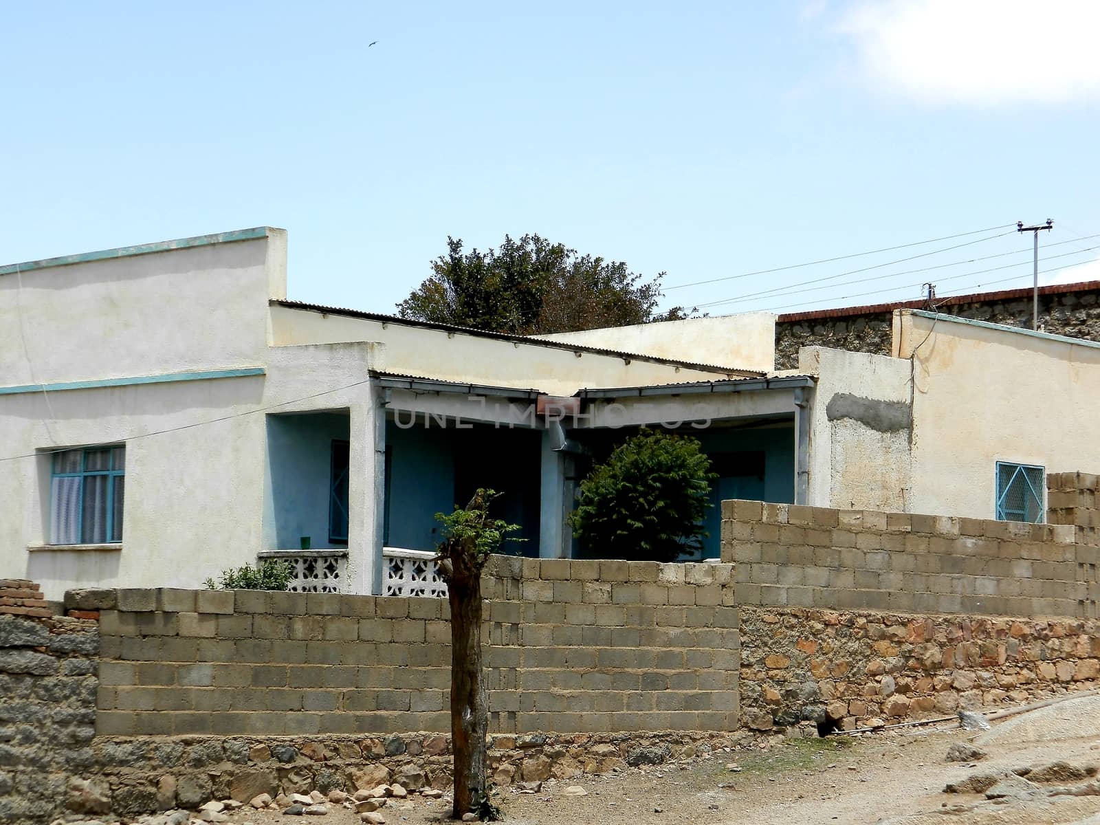 Tesseney, Eritrea - 10/11/2020: Beautiful photography of the landscape from the villages near the bord from Ethiopia. Old desert villages with some domestic animals.