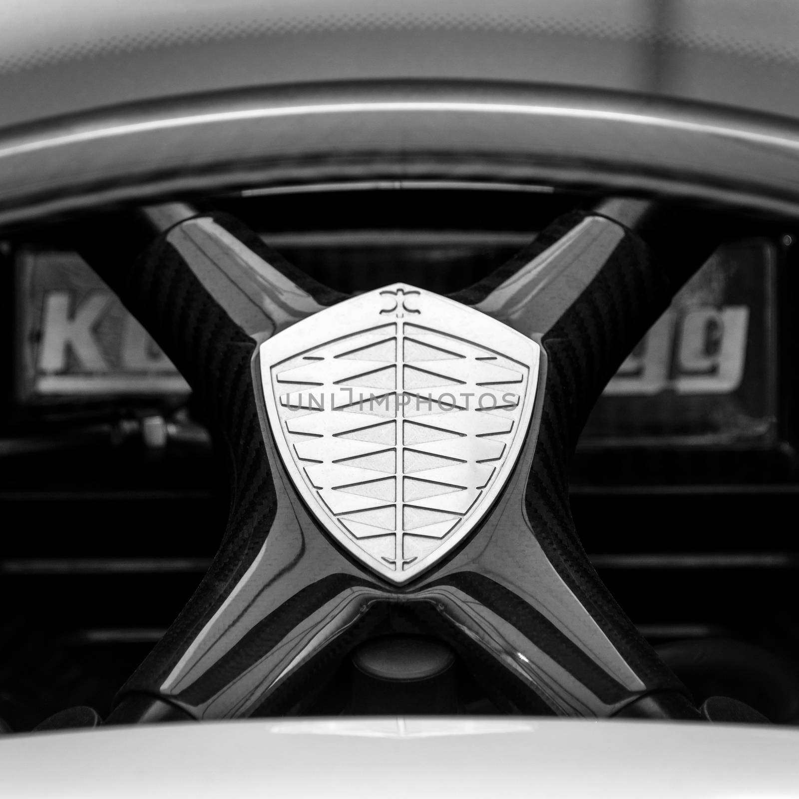 Koenigsegg logo on the back of an Agera R, in black and white