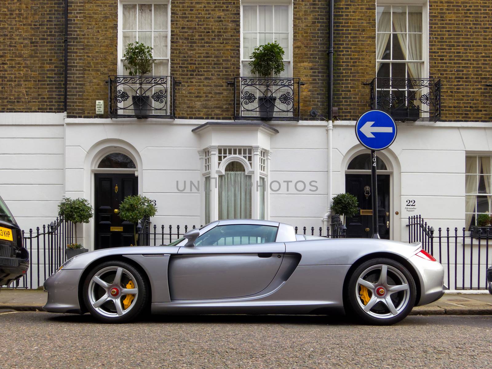 LONDON, UK - CIRCA MARCH 2013: A Porsche Carrera GT parked in the street. The Carrera GT is a mid-engined sportscar produced between 2004 and 2007.