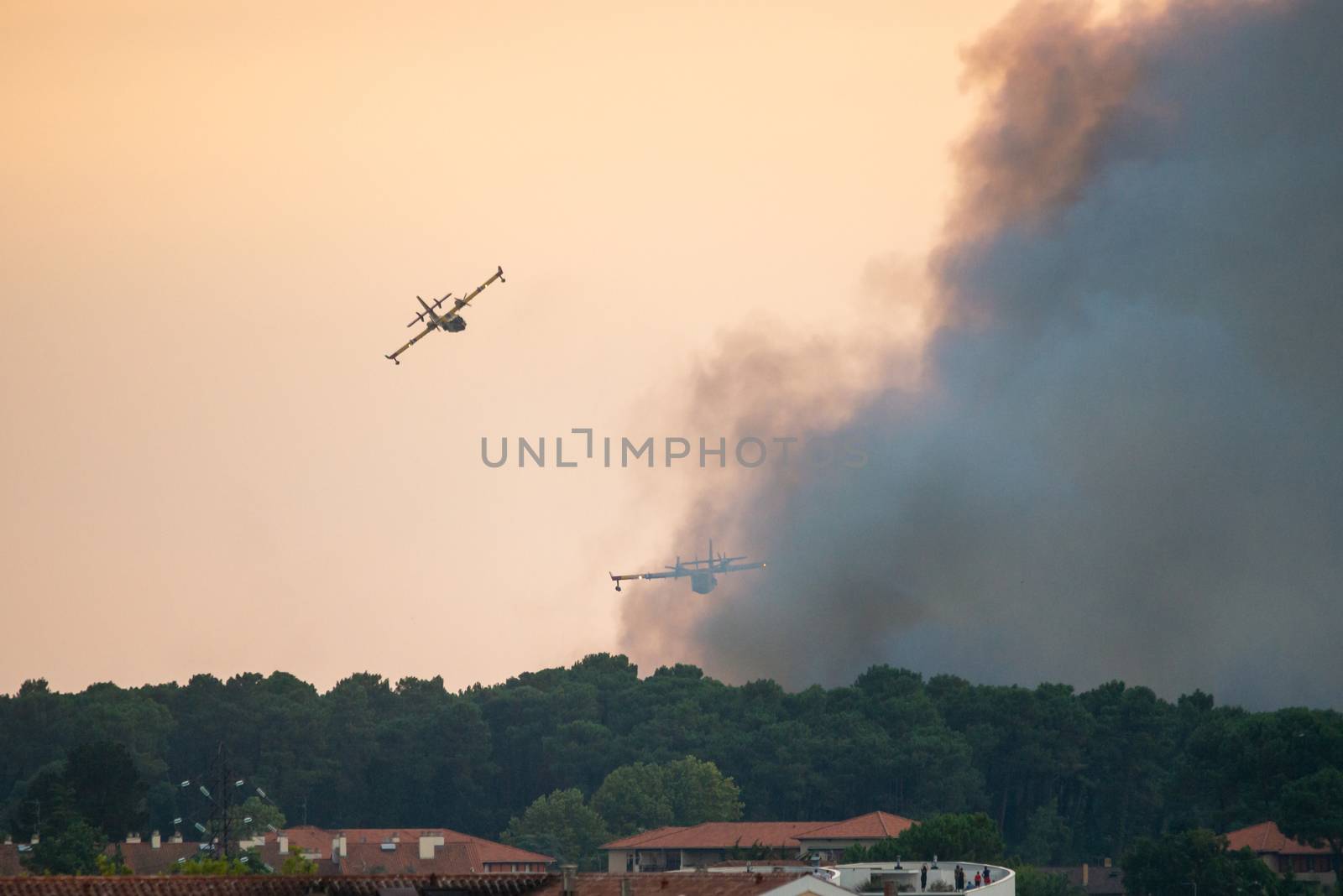 BAYONNE, FRANCE - 30 JULY, 2020: Two Canadair CL-415 from the French Securite Civile came from Marseille to help tackle the Chiberta forest fire in Anglet.