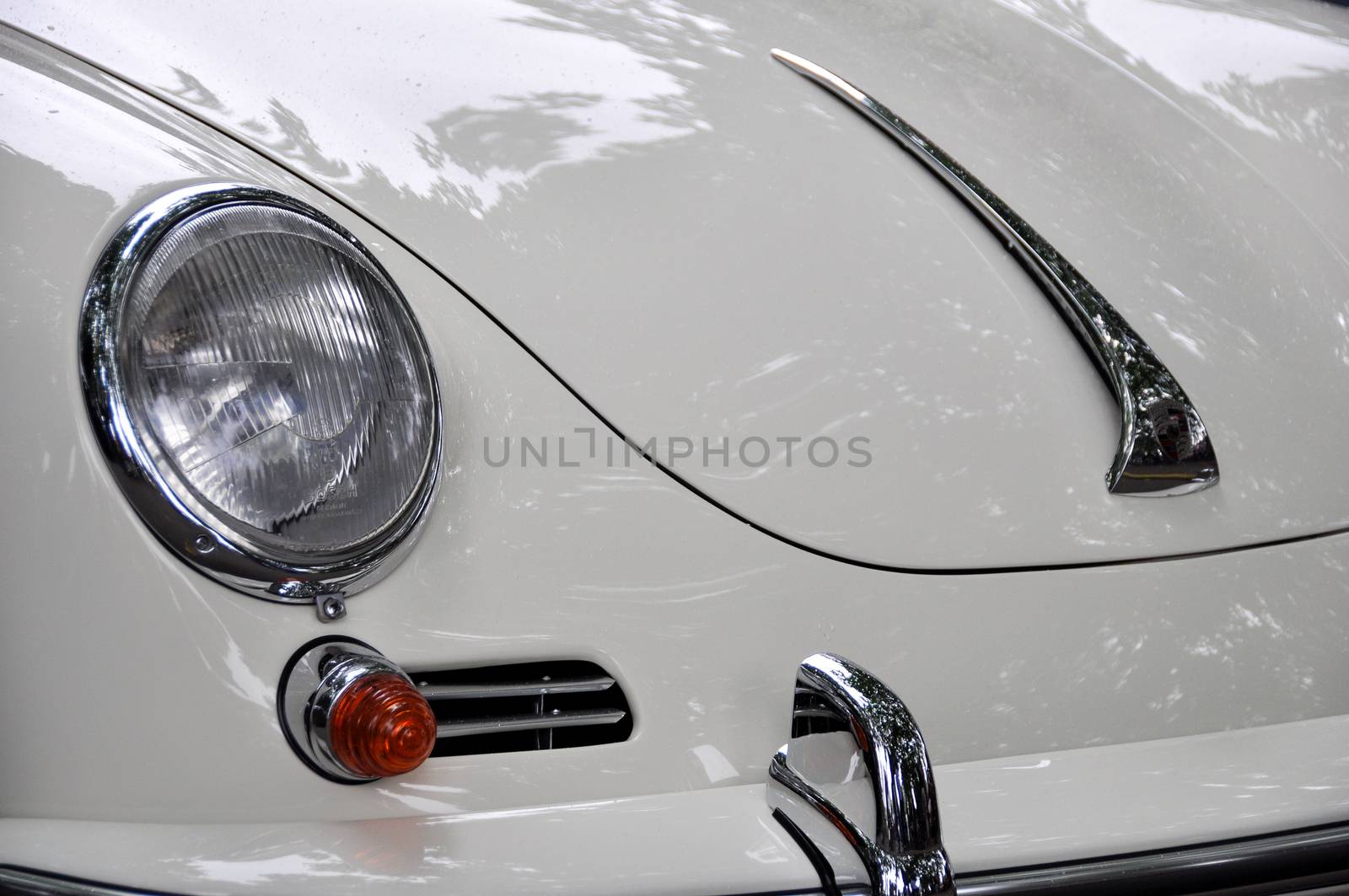 LONDON, UK - CIRCA SEPTEMBER 2011: Closeup shot of a white Porsche 356 C at Chelsea Autolegends car show.