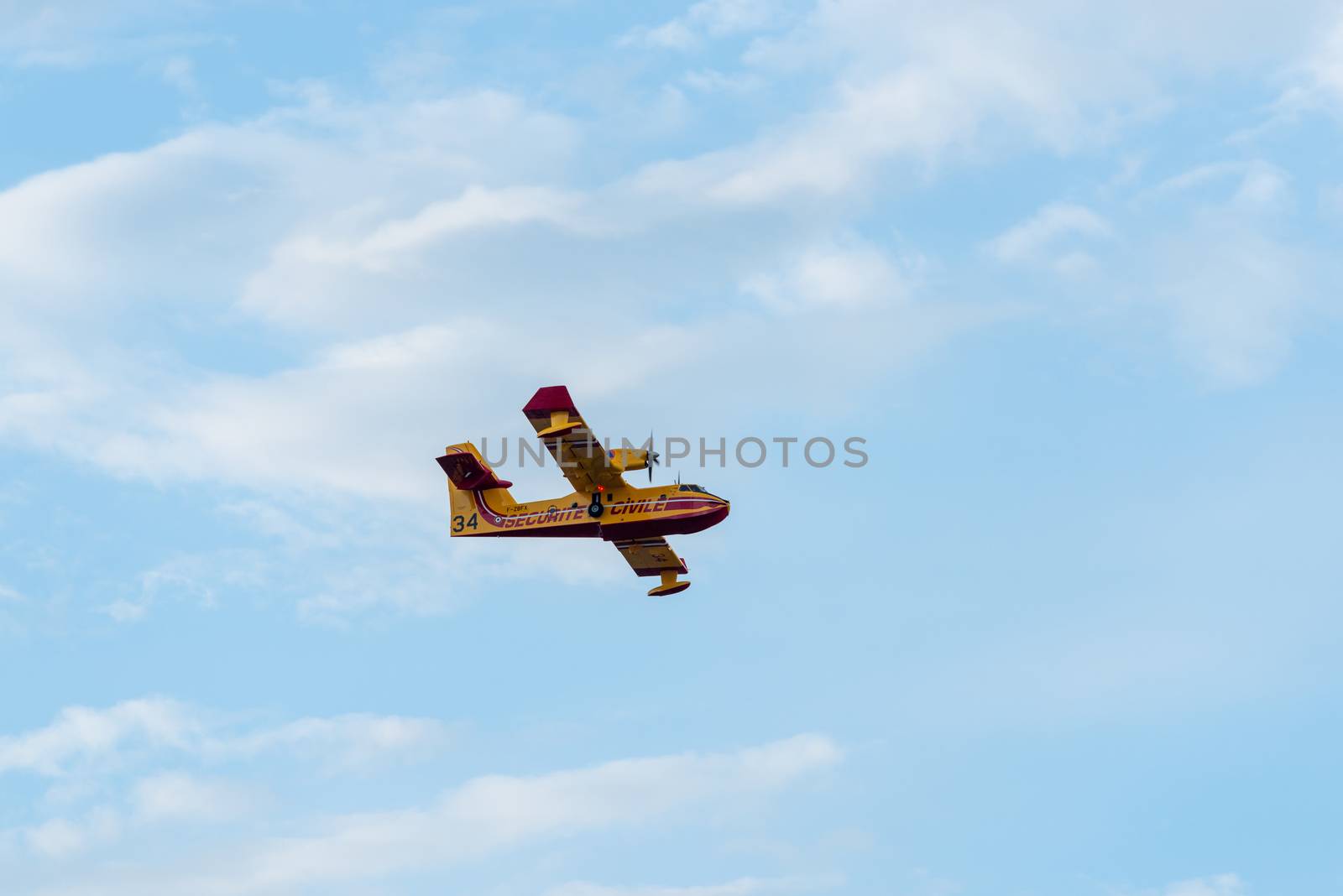 Canadair CL-415 amphibious water bomber in flight by dutourdumonde