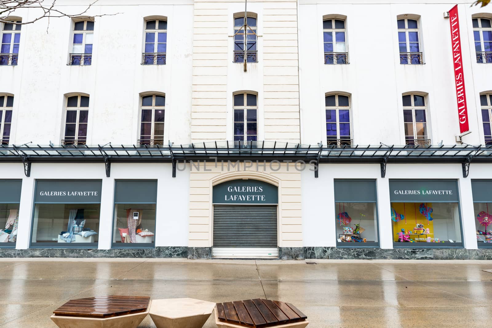 BAYONNE, FRANCE - MARCH 16, 2019: The Galeries Lafayette store is closed because of the outbreak of Coronavirus and the subsequent lockdown.