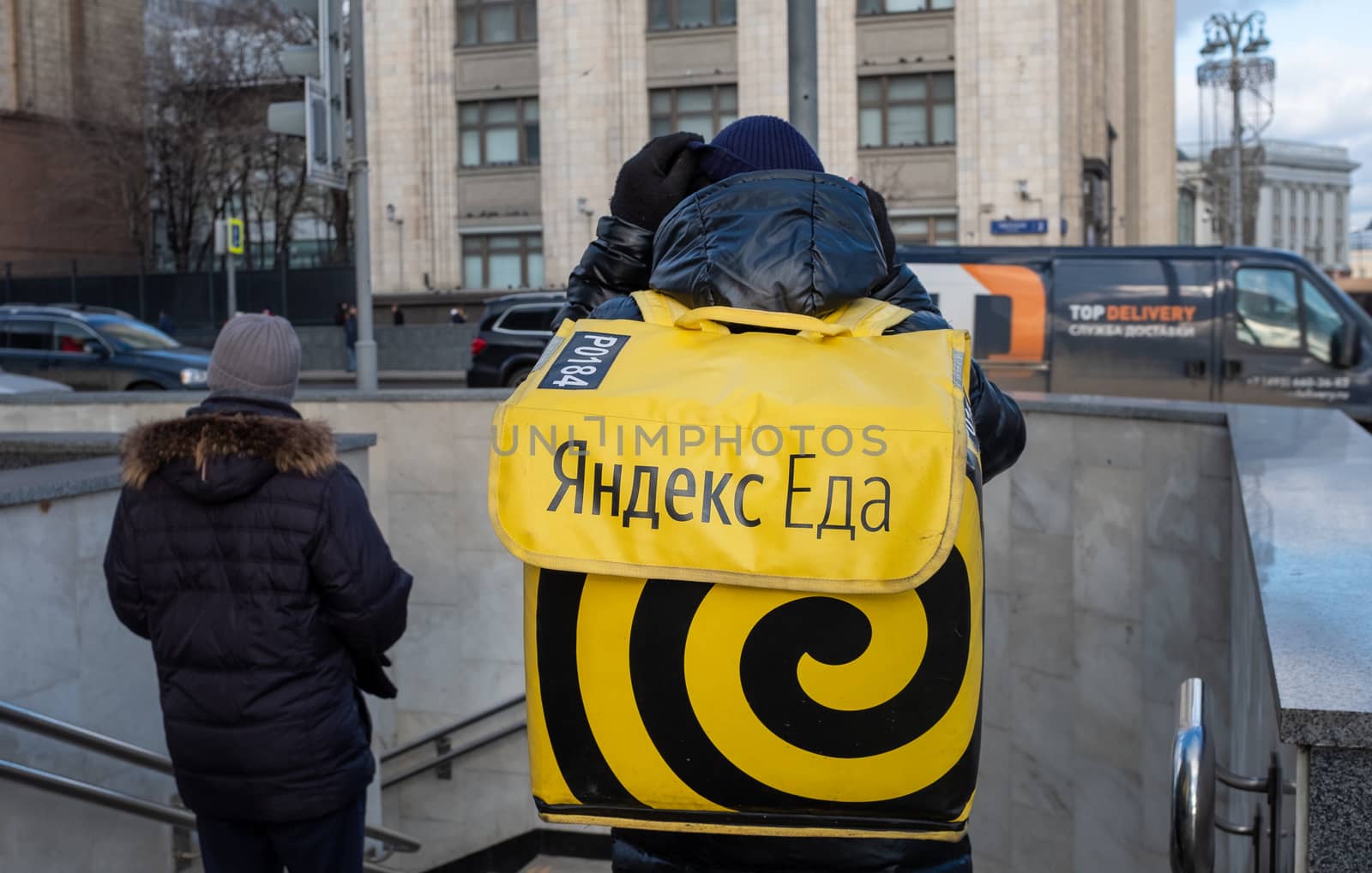 February 5, 2020 Moscow, Russia. An employee of the Yandex Food delivery service on a Moscow street.