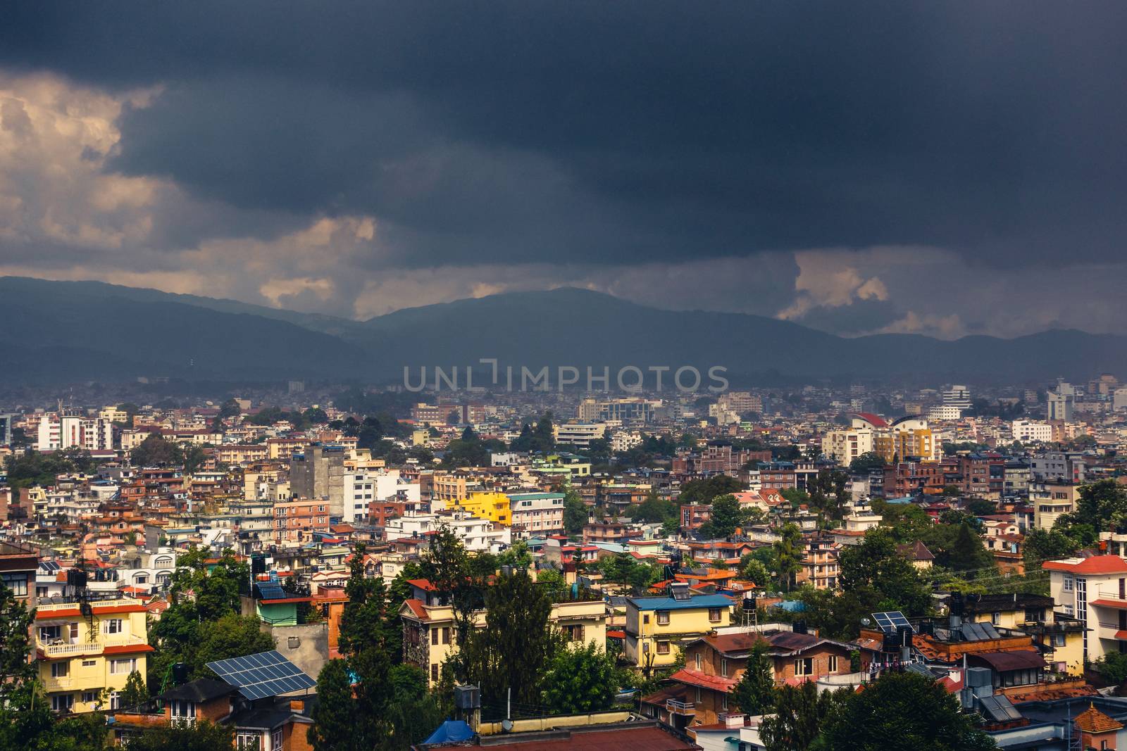 Dark clouds over Patan and Kathmandu, Nepal by dutourdumonde