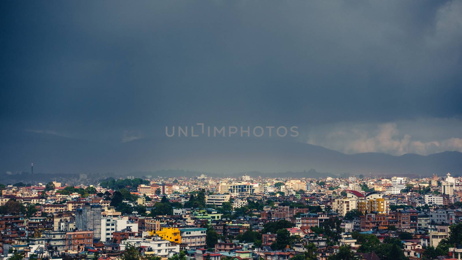 Dark clouds over Patan and Kathmandu, Nepal by dutourdumonde