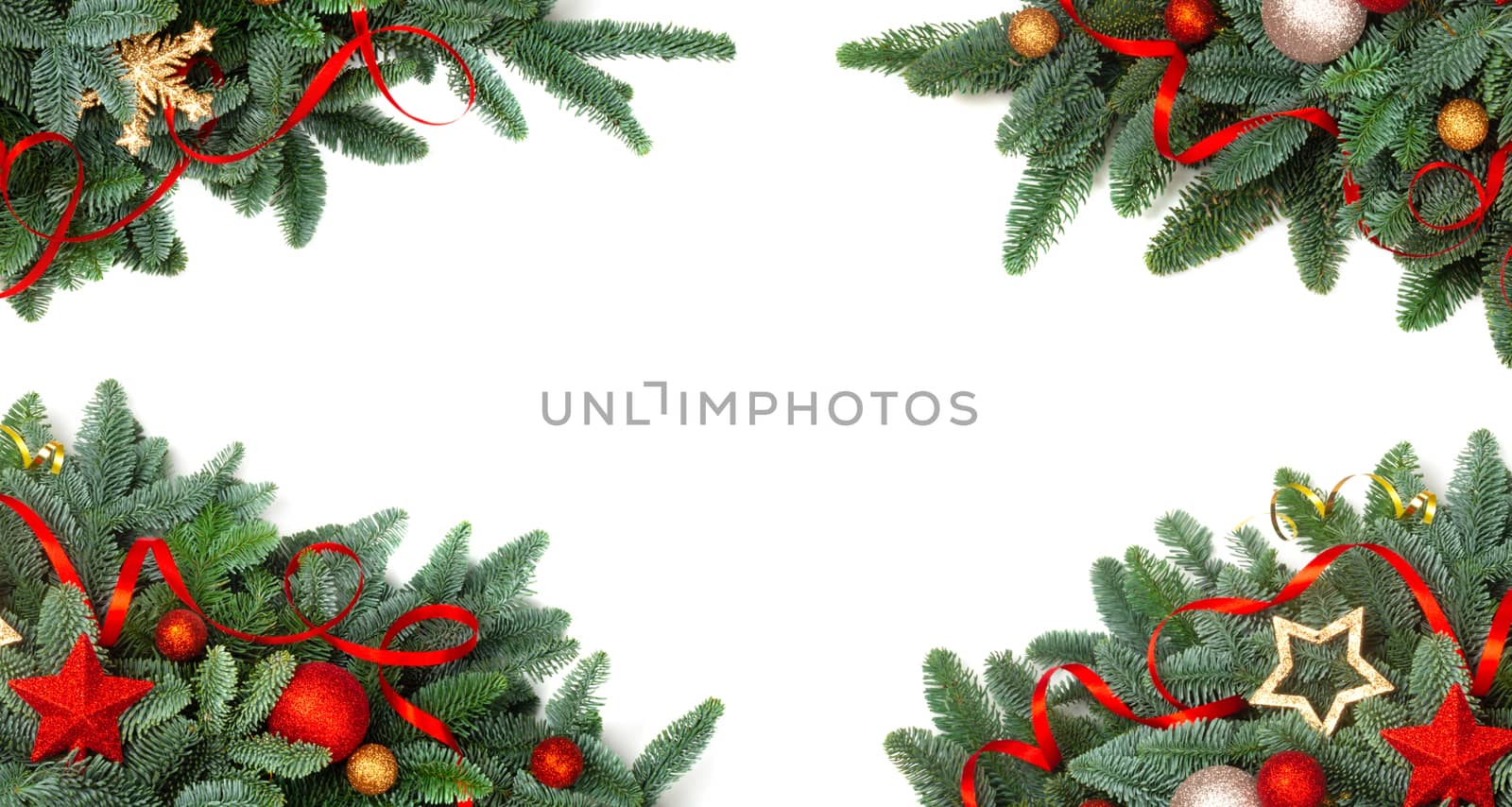 Christmas design element border frame of noble fir tree branches and red and golden baubles isolated on white background