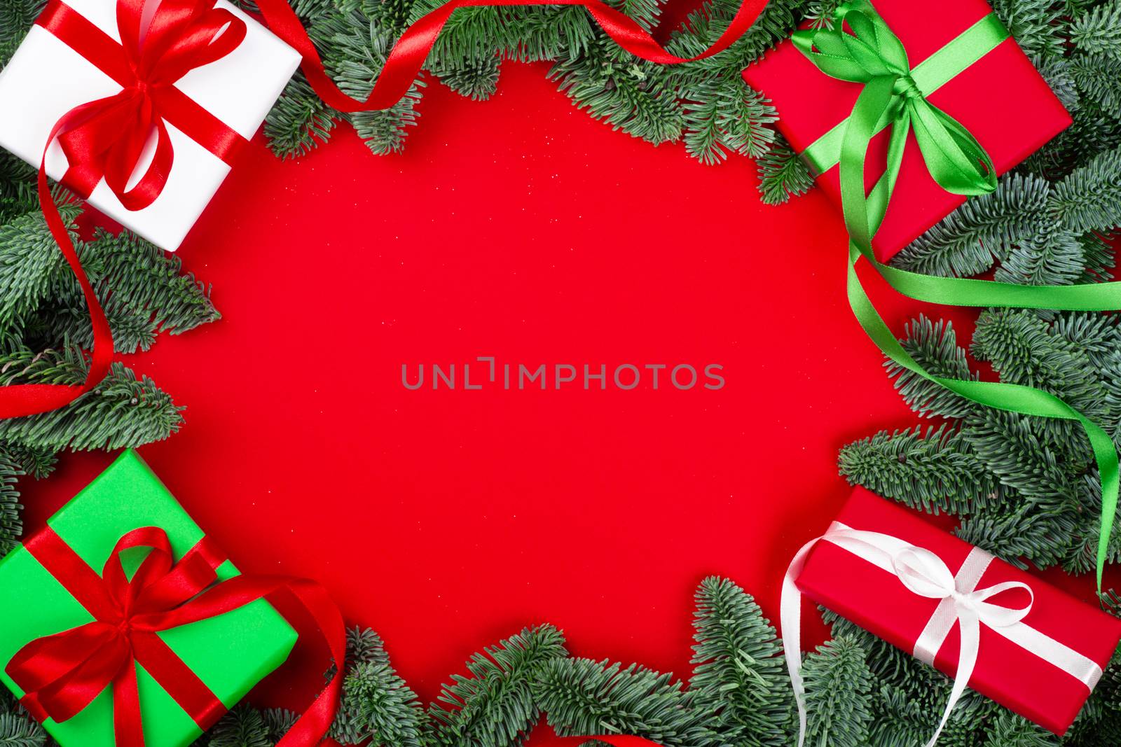 Christmas or New Year background composition made of Xmas decorations and fir tree branches and gifts with copy space for text