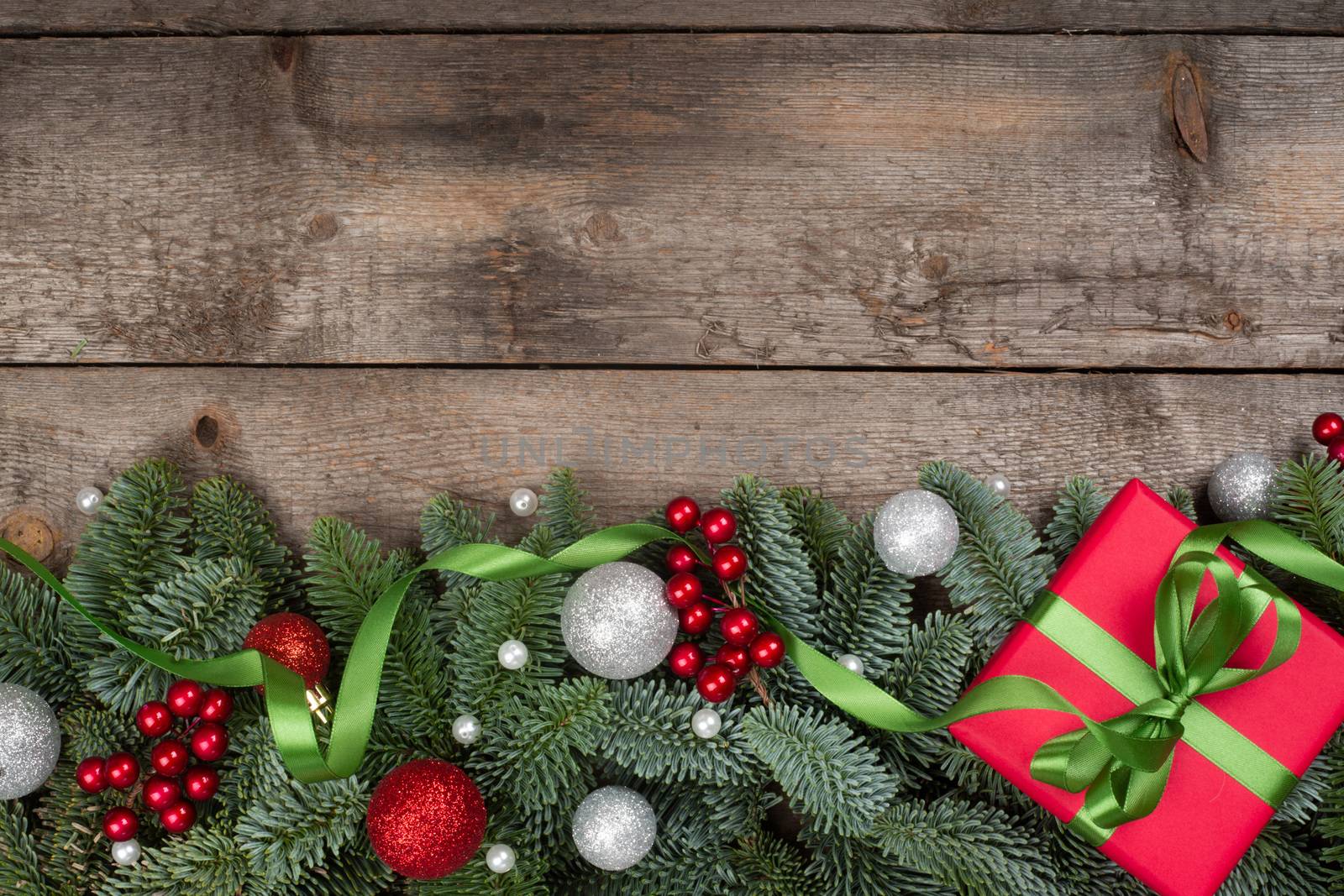 Christmas gift and fir branches by destillat