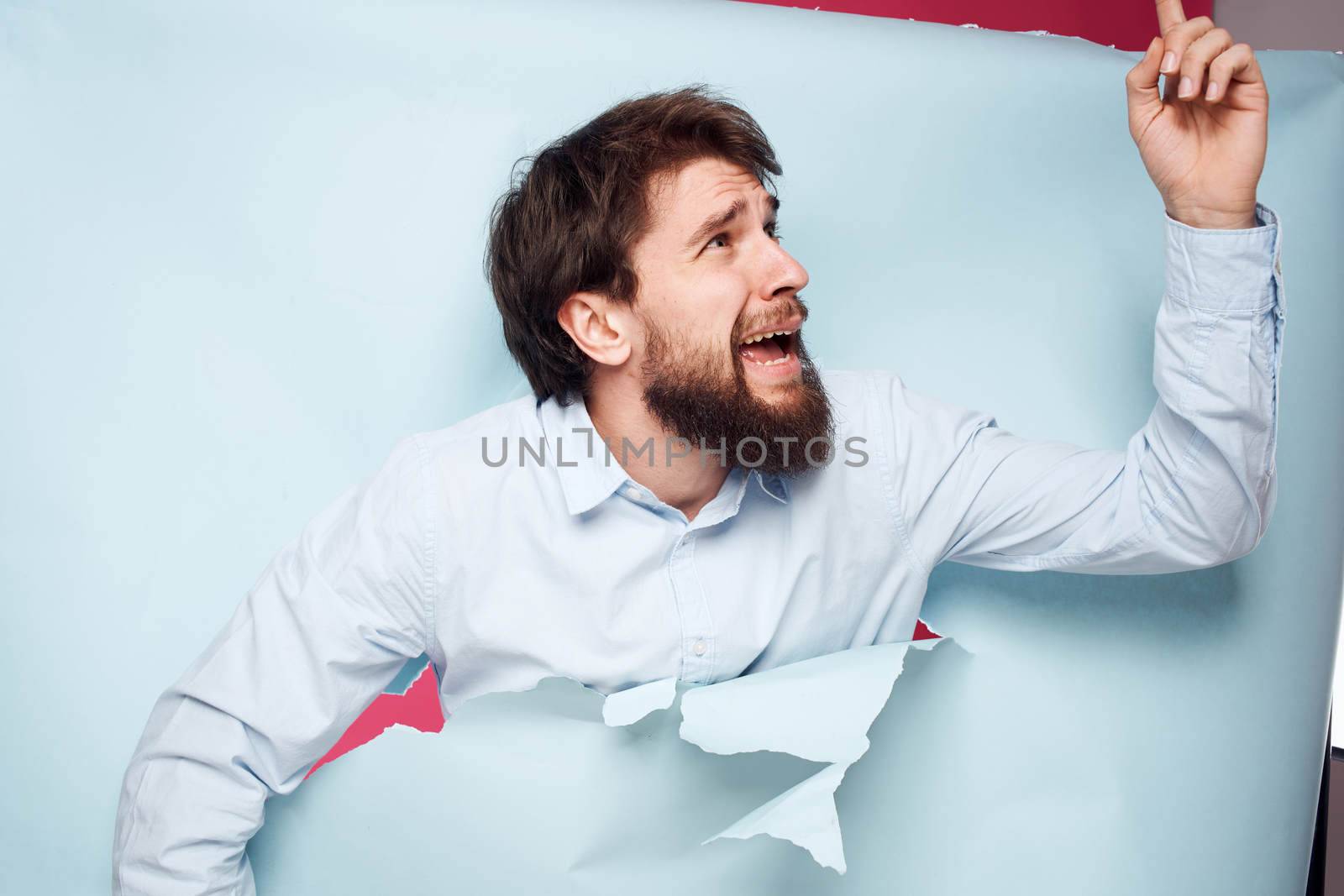Man in shirt over wall emotions lifestyle fun office corporate party. High quality photo