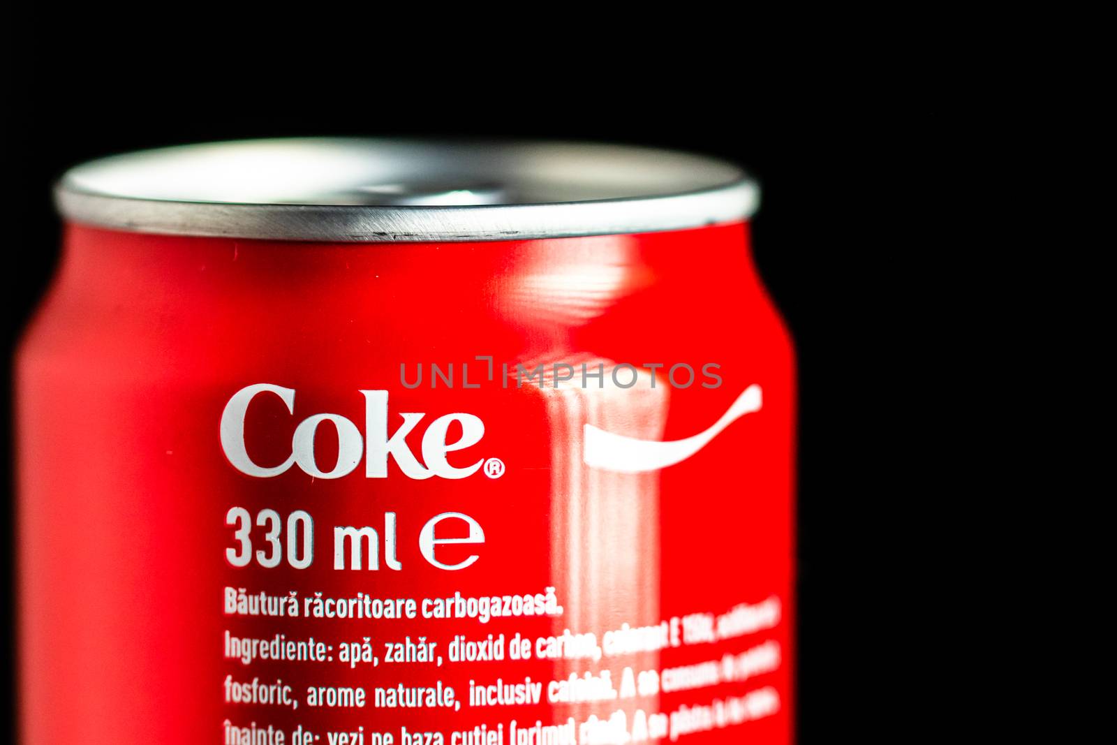 Editorial photo of classic Coca-Cola can on black background. Studio shot in Bucharest, Romania, 2020