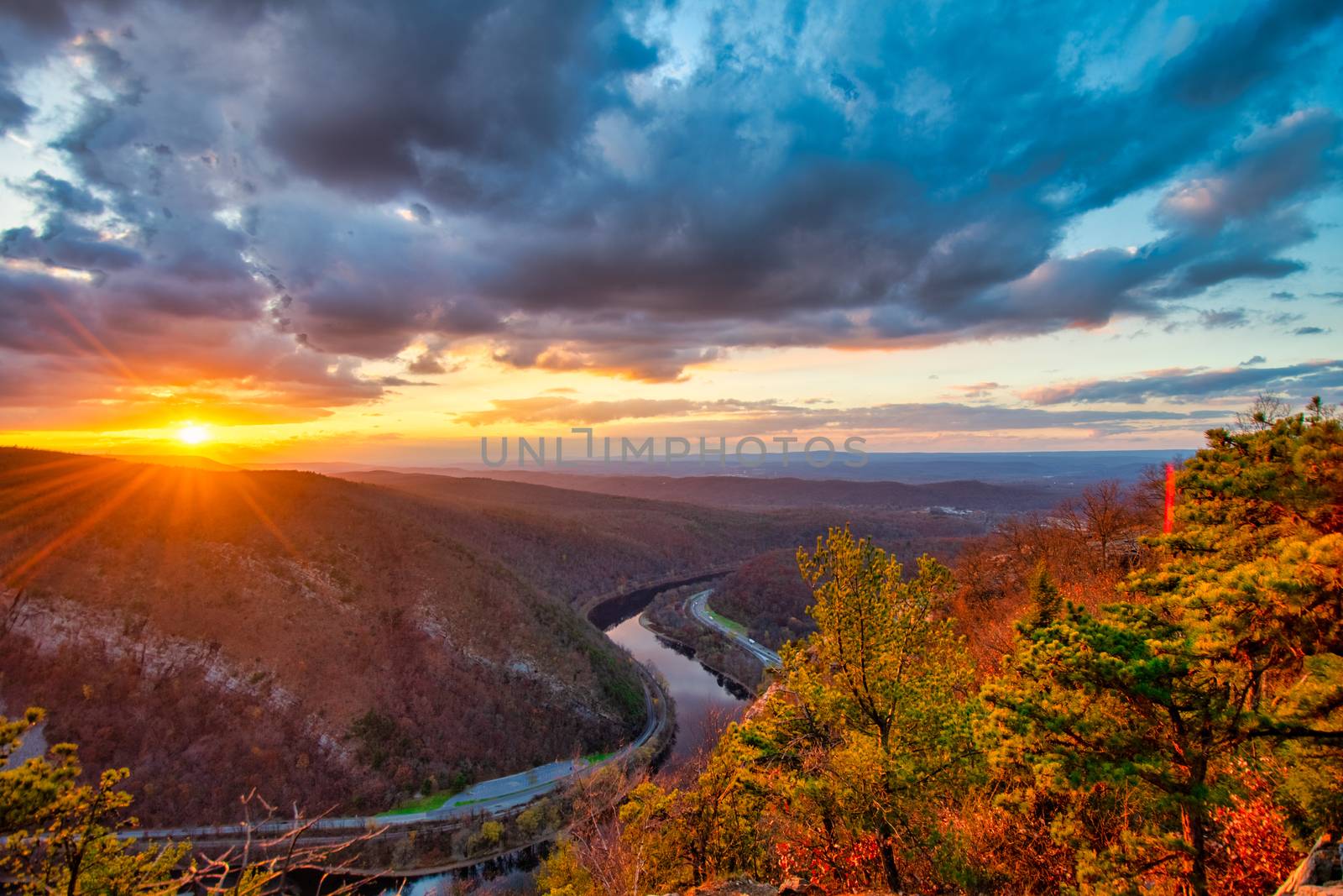 A View of the Sunset From the Peak at Mount Tammany at the Delaw by bju12290