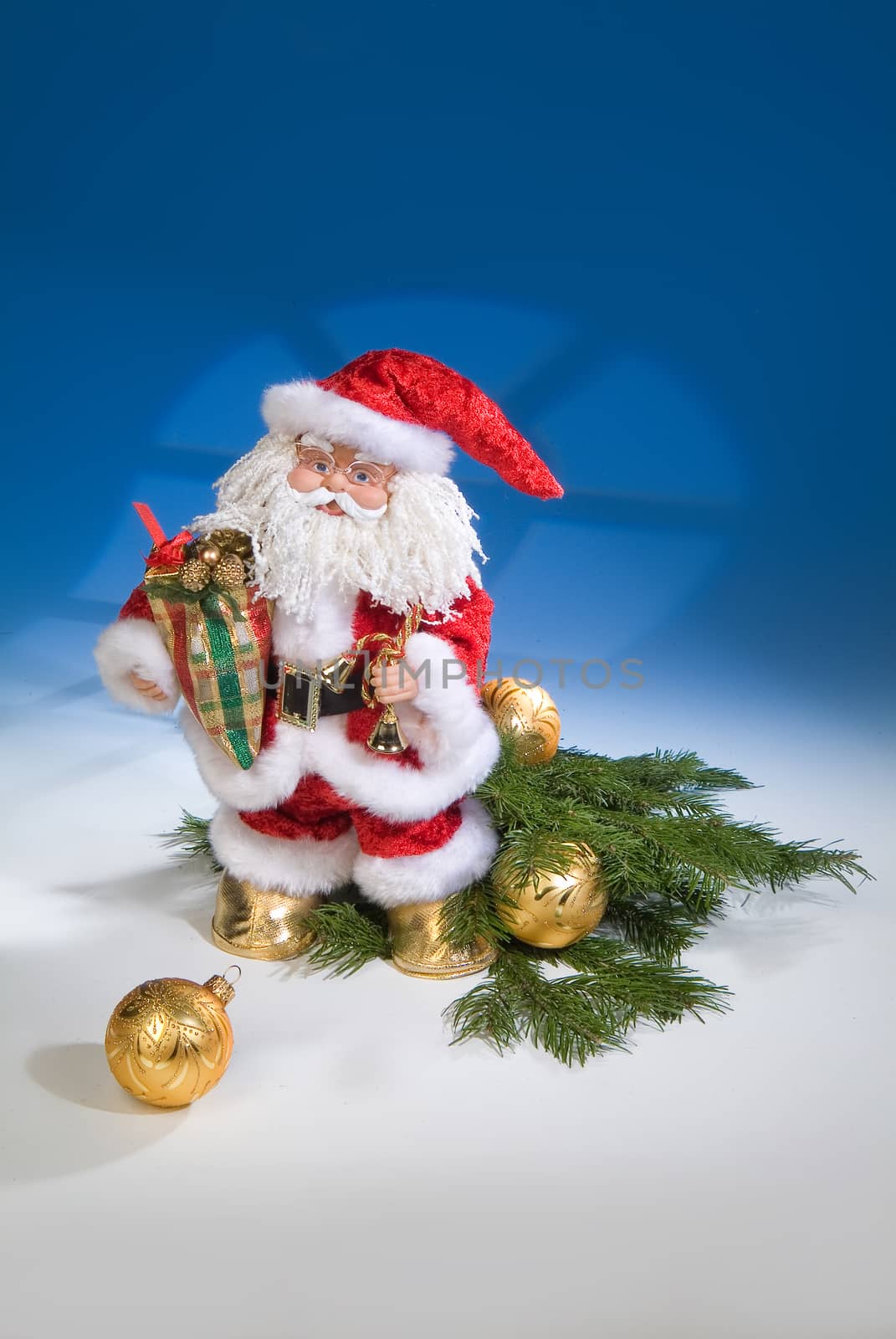 Santa Klaus statuette on a studio background
