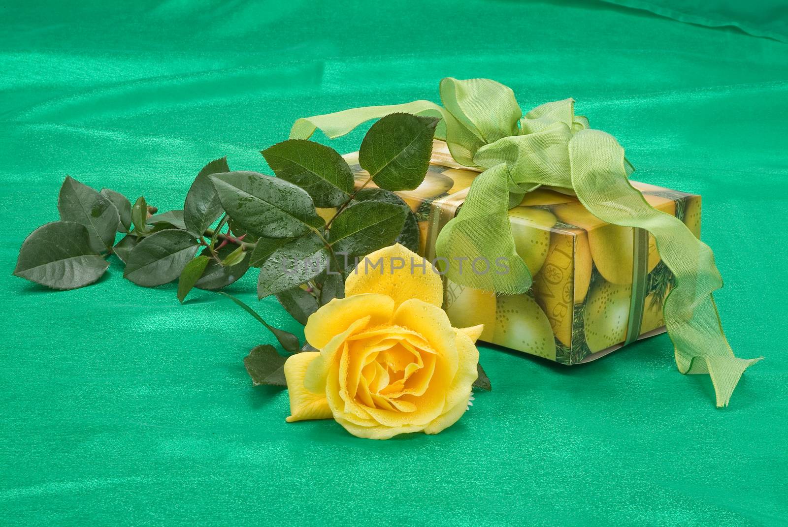 Still life with bouquet of flowers and accessories on a studio background