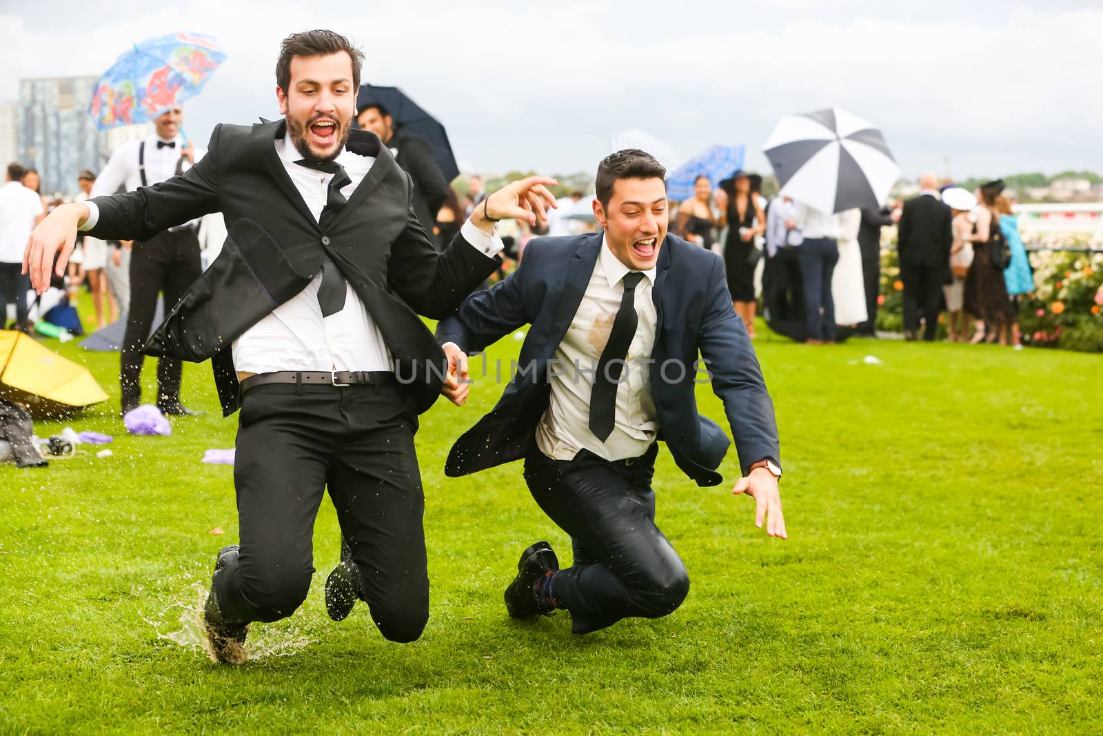 MELBOURNE, AUSTRALIA - NOVEMBER 2: Drunk punters at the end of Derby Day at the 2019 Melbourne Cup Carnival at Flemington Racecourse in Melbourne Australia