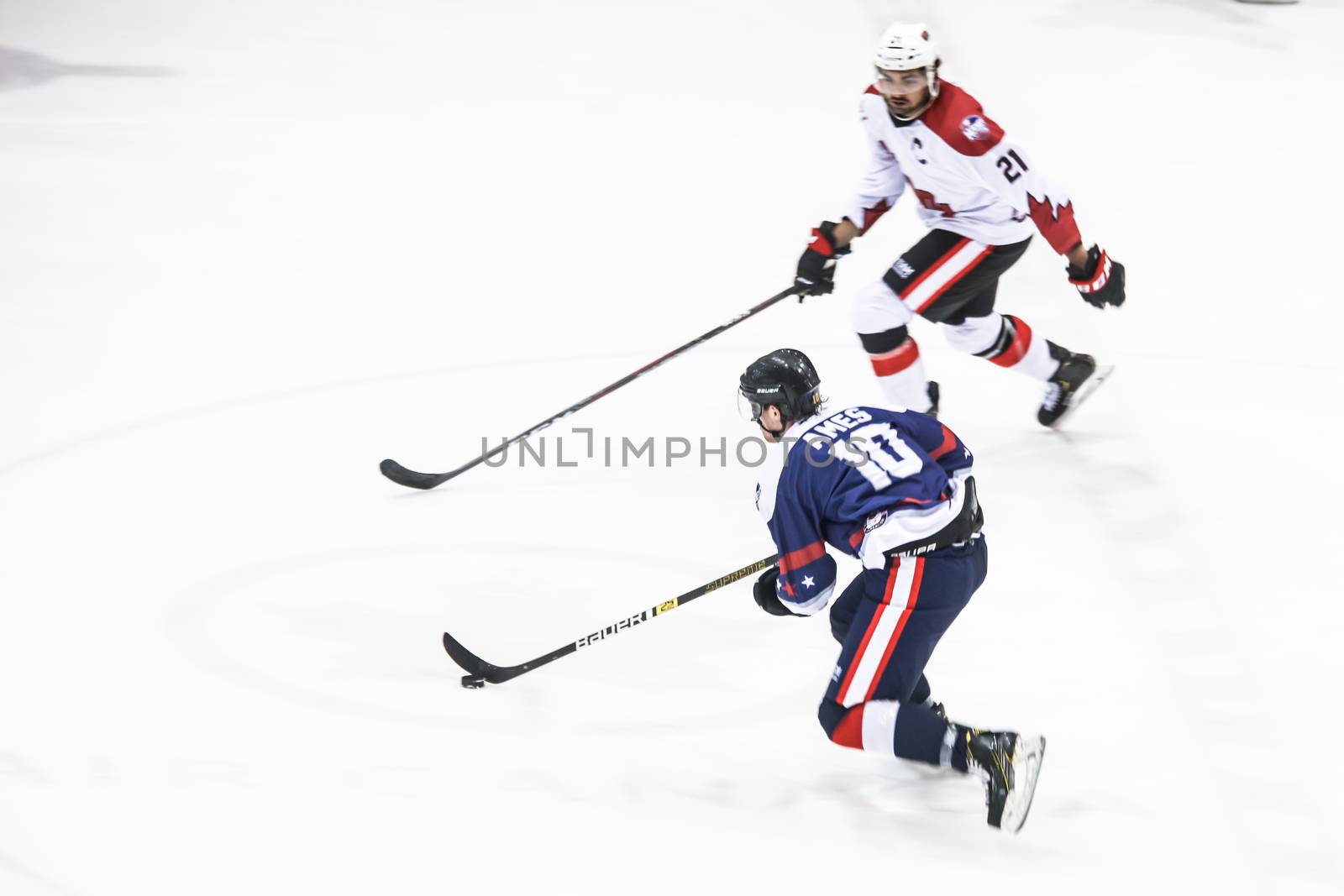 MELBOURNE, AUSTRALIA - JUNE 21: Preston Ames of USA skates with the puck in the 2019 Ice Hockey Classic in Melbourne, Australia