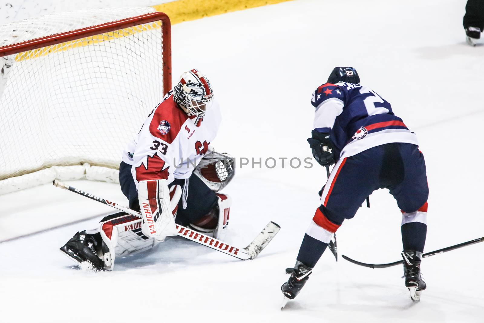 MELBOURNE, AUSTRALIA - JUNE 21: Chris Driedger of Canada stops a shot in the 2019 Ice Hockey Classic in Melbourne, Australia