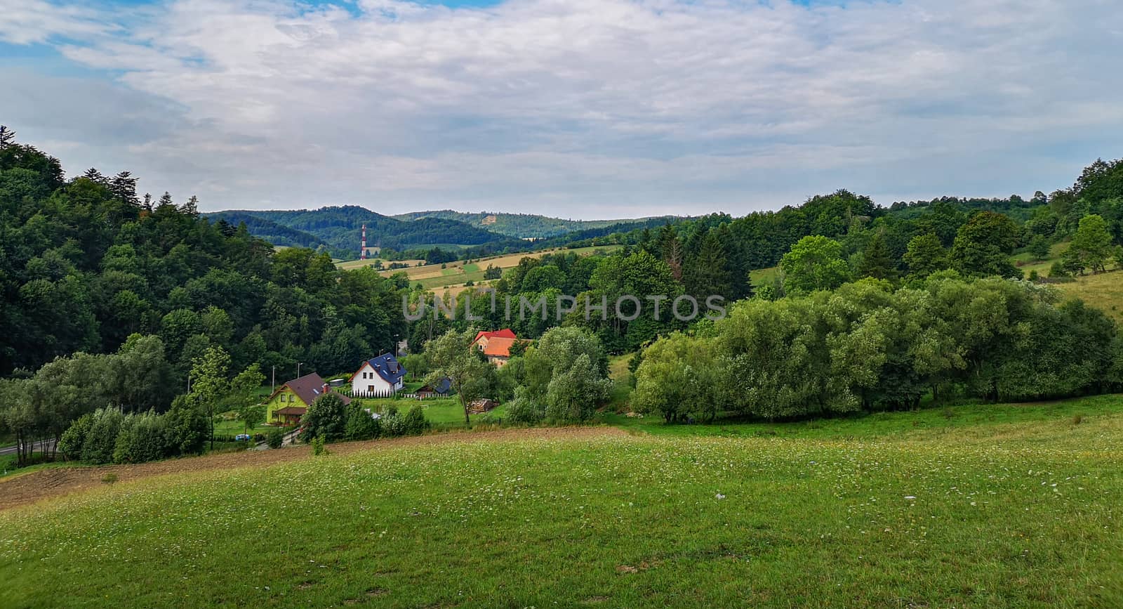 Panoramic view to landscape full of hills and mountains by Wierzchu