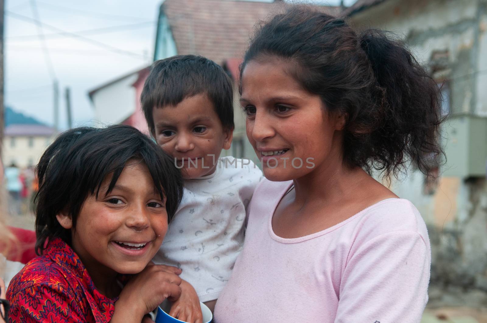 5/16/2018. Lomnicka, Slovakia. Roma community in the heart of Slovakia, living in horrible conditions. Portrait of mother and children.. by gonzalobell